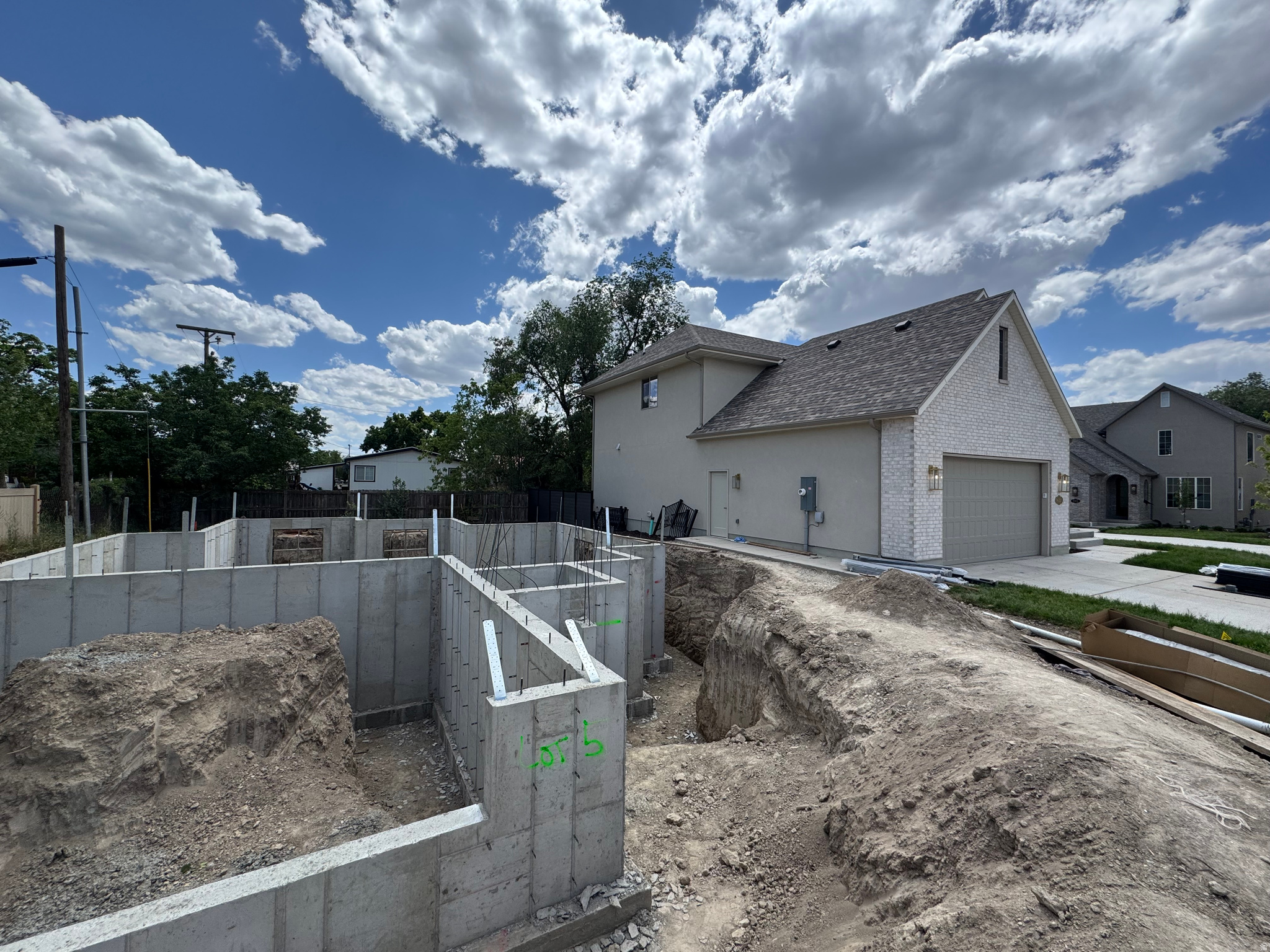 *Update May 29, 2026* Construction has started!  Foundation is in!  LAST home available in this Brand New 5 Lot Millcreek Cottages subdivision with no HOA! Act quickly on this popular main floor primary bedroom plan!  Now is your chance to customize with your color choices and upgrades, or let us build you a professionally designed masterpiece.  We have a similar floor plan nearly complete in the subdivisions you can tour with an agent. Located in the heart of Millcreek . . . an area loved by generations for being central to downtown life and the mountain adventures alike. This lux cottage two-story will feature a classic brick or stone exterior, custom metal & glass arched front door, arched built-in's with a  gorgeous cast stone fireplace, and a spacious chef's kitchen with an open family and dining area.  Includes 9ft ceilings on the main and finished basement. Call for more details and to secure this masterpiece home now!  Photos are of similar homes built by this builder and serve as a representation of the quality and finishes you can expect in this home.