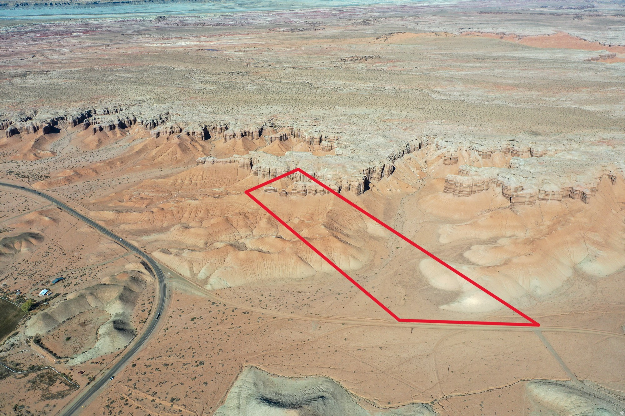 Percolation test done, property has water right. 20.58 acres. Survey pins show edges of property. 28 miles to Capitol Reef. 32 Miles To Goblin Valley. Buyer and buyers agent to verify all information. Pictures lot lines are approximate.