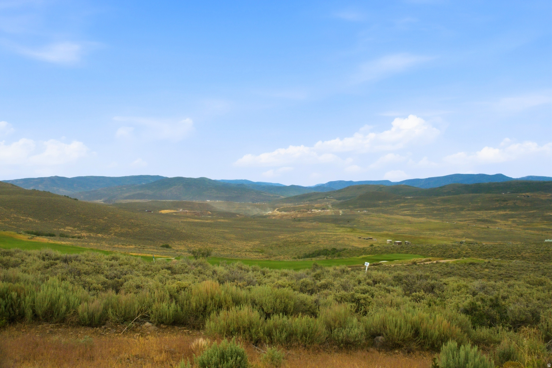 Lowest Price Homesite Offering a Full Golf Membership to Promontory!  One of the few remaining homesites in Promontory offering the rare opportunity to obtain an immediate Full Golf Membership, this exceptional homesite presents an unmatched chance to begin enjoying the club's premier lifestyle without delay. Set on just under one acre within the private, gated community, the property captures breathtaking panoramic views of the Uinta National Forest while overlooking the Jack Nicklaus Signature Golf Course in the coveted Painted Valley neighborhood. The elevated building envelope provides an ideal setting for a custom mountain estate, maximizing expansive vistas, privacy, and year-round natural beauty. Whether enjoying sunrise over the Uintas or watching golfers navigate one of Promontory's most scenic holes, the views are truly extraordinary. Beyond the homesite itself, owners enjoy access to Promontory's award-winning collection of amenities, including championship golf, multiple clubhouses, exceptional dining, spa and wellness facilities, fitness centers, pools, tennis, pickleball, beach club, equestrian facilities, and endless year-round family activities. Opportunities to build on a homesite of this caliber-with immediate Full Golf Membership availability-are exceptionally limited.