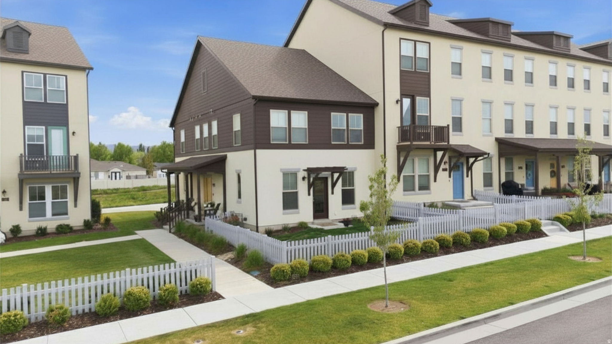 Welcome to this beautifully maintained end-unit townhome in the highly desirable Daybreak community of South Jordan. Ideally positioned beside open green space and in a truly central Daybreak location, this home is just minutes from Downtown Daybreak, Highland Park, Highland Park Pool, the Cove House, and the watercourse.  Featuring 3 bedrooms, 2.5 bathrooms, and 1,651 square feet, the home offers a bright, open-concept layout with large windows and vaulted ceilings that create a spacious, inviting feel. The kitchen is both functional and stylish, complete with a large island, gas range, and modern finishes, flowing seamlessly into the dining and living areas.  Upstairs, the primary suite includes a walk-in closet and a separate tub and shower. Two additional bedrooms and a versatile loft provide flexible space for a home office, playroom, or additional living area.  As a row-end unit, the home enjoys extra windows, enhanced privacy, and a fully fenced yard-ideal for pets, outdoor living, and everyday use. The front porch overlooks open green space, creating a welcoming extension of the home and a great place to enjoy the neighborhood setting.  Additional features include a two-car attached garage with extra height and storage, smart thermostat, video doorbell, and instantaneous hot water.  Just nearby, Highland Park offers expansive green space, a playground, covered pavilion, pickleball courts, and soccer fields, while Highland Park Pool provides lap swim, open swim, and seasonal activities. Residents also enjoy Daybreak's full network of parks, trails, fitness centers, and community amenities.  The HOA includes high-speed internet, exterior maintenance, landscaping, and snow removal for convenient, low-maintenance living.  Located near Mountain View Corridor with quick access to shopping, dining, schools, and entertainment, this home offers an exceptional blend of comfort, convenience, and lifestyle in one of South Jordan's most sought-after communities.
