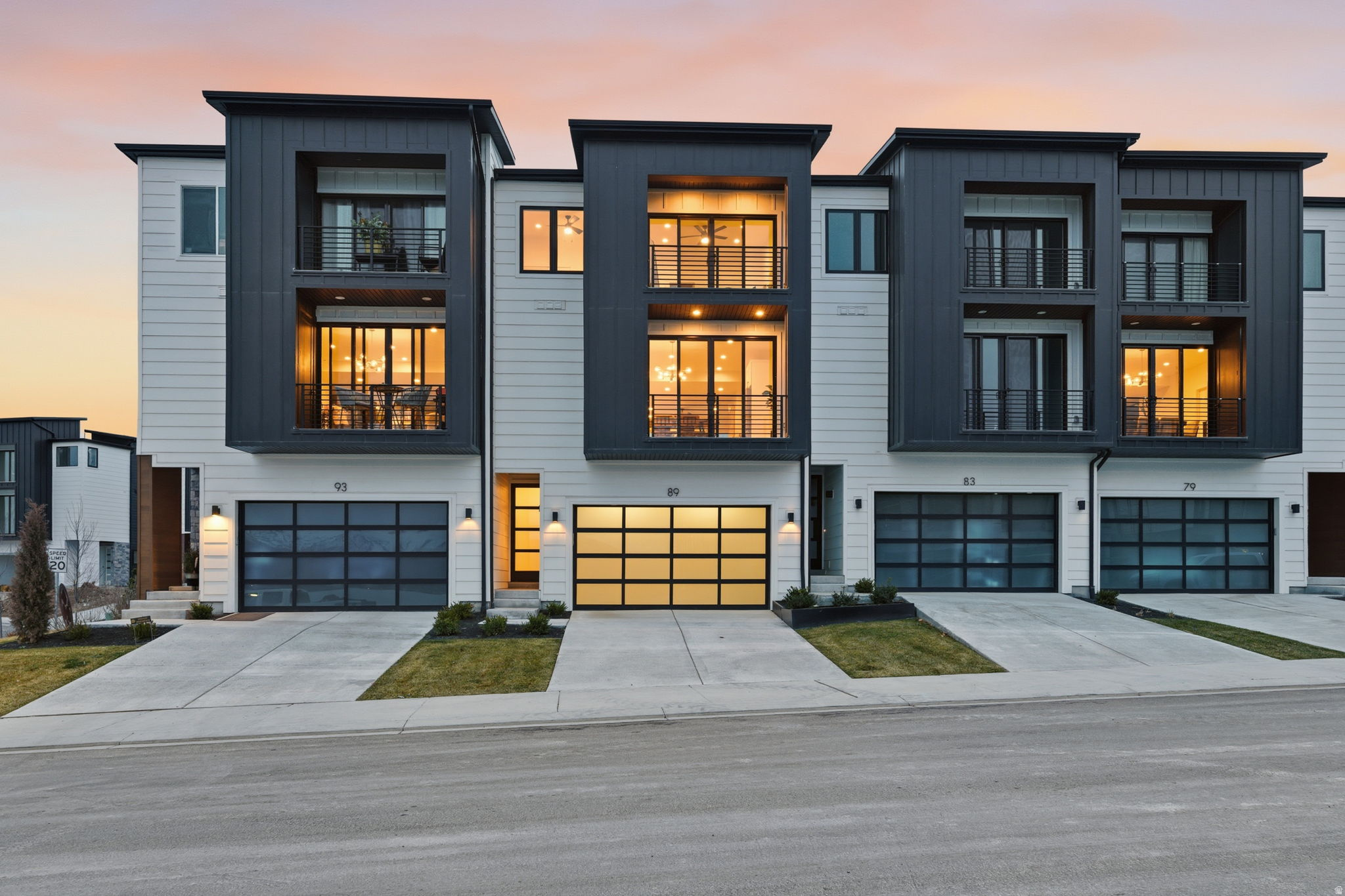 Experience elevated living in this stunning three-story luxury townhome located along TalonsCove Golf Course and just minutes from Utah Lake. Set within a resort-style community, this home offers an exceptional combination of modern design, recreation, and scenic surroundings. The first floor features a versatile flex space that can serve as a home office, guest room, additional bedroom, or private retreat, along with a convenient half bathroom. The second floor offers a bright, open-concept kitchen, dining, and living area. Floor-to-ceiling windows at both ends fill the space with natural light, creating an inviting setting for entertaining or relaxing. The home includes thoughtful, high-end upgrades throughout, including semi-custom soft-close cabinetry, 3-centimeter quartz kitchen countertops, upgraded windows and sliding glass doors, 8-foot interior doors, custom lighting, additional recessed lighting with ceiling-fan wiring, sound-insulated walls around the toilet area, built-in internet access points, and plumbing for a water softener. A wider-than-standard staircase and large statement window add to the open, luxurious feel. Additional features include a tankless water heater and a finished garage with durable epoxy flooring, an aluminum-and-glass garage door, added lighting, and a security camera. Residents enjoy outstanding community amenities, including a year-round heated mineral pool fed by local hot springs, a second outdoor swimming pool, two clubhouses with fitness facilities and event space, a private marina and boat launch on Utah Lake, a large pavilion, parks, playgrounds, and miles of connected walking and nature trails. Enjoy luxury living just steps from TalonsCove Golf Course and minutes from the water, where comfort, recreation, and modern design come together in an exceptional place to call home.
