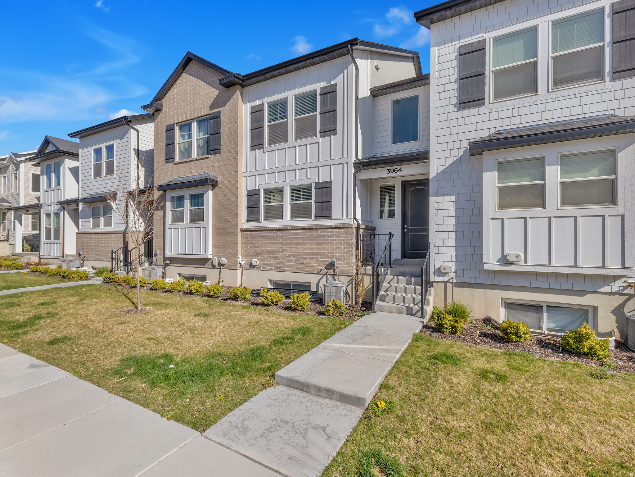 OFFERING A 1-0 RATE BUYDOWN!!! (1% rate discount for one year) Promotion is through our preferred lender, Eni O'Donnell with CrossCountry Mortgage NMLS #1261450. Welcome to 3964 W Hardman Way, a well-appointed townhome in the desirable Willow Point community. This 3-bedroom, 2.5-bath home features an open-concept main level with vaulted ceilings, creating a bright and functional living space. The spacious primary suite includes an ensuite bath and walk-in closet, while the unfinished basement offers room to grow.  Enjoy community amenities including a pool, clubhouse, and playgrounds, all designed for low-maintenance living. Ideally located in the heart of Lehi, you're just minutes from Traverse Mountain shopping and dining, Thanksgiving Point, outdoor trails, and have quick access to major roadways for an easy commute. Square footage figures are provided as a courtesy estimate only and were obtained from county records .  Buyer is advised to obtain an independent measurement.