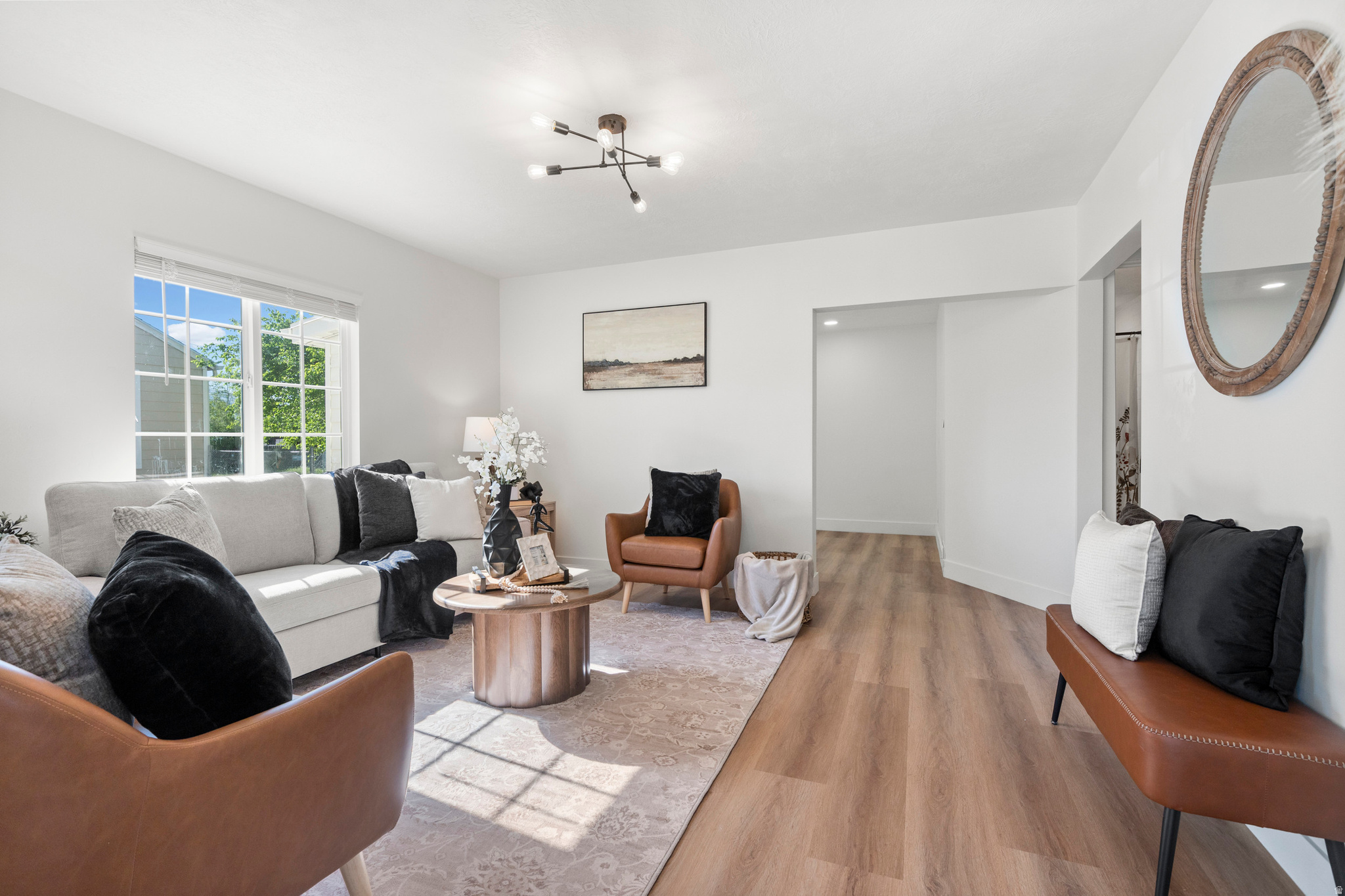 This beautifully updated home offers more space than meets the eye with 2,860 sq ft, 5 bedrooms, and 3 bathrooms. The main level features a private primary suite complete with its own bathroom, along with a warm and inviting living area and an oversized family room highlighted by a stylish new electric fireplace. Downstairs, you'll find a fully equipped 2-bedroom, 1-bath mother-in-law apartment with a separate entrance-perfect for guests, rental potential, or multi-generational living. Nearly every detail has been refreshed, including brand-new kitchen cabinetry, fixtures, hardware, plumbing, electrical, windows, tile, vanities, tubs, toilets, and more. All information deemed accurate. Buyer to verify all.