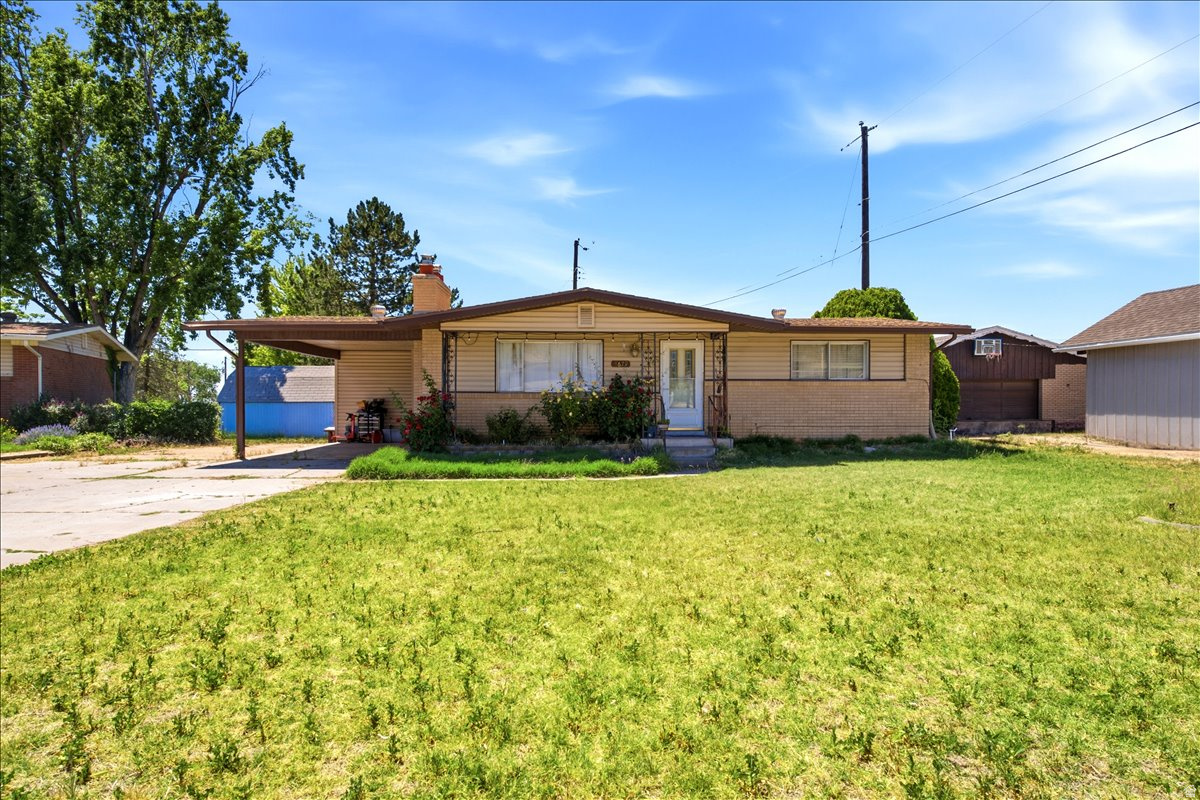 Located on a quiet street, but close to everything you need. Great price for a single-family home in Roy. Fully fenced back yard and RV parking next to carport. Newer shower surround in upstairs bathroom. Square footage figures are provided as a courtesy estimate only and were obtained from county records.  Buyer is advised to verify all information.