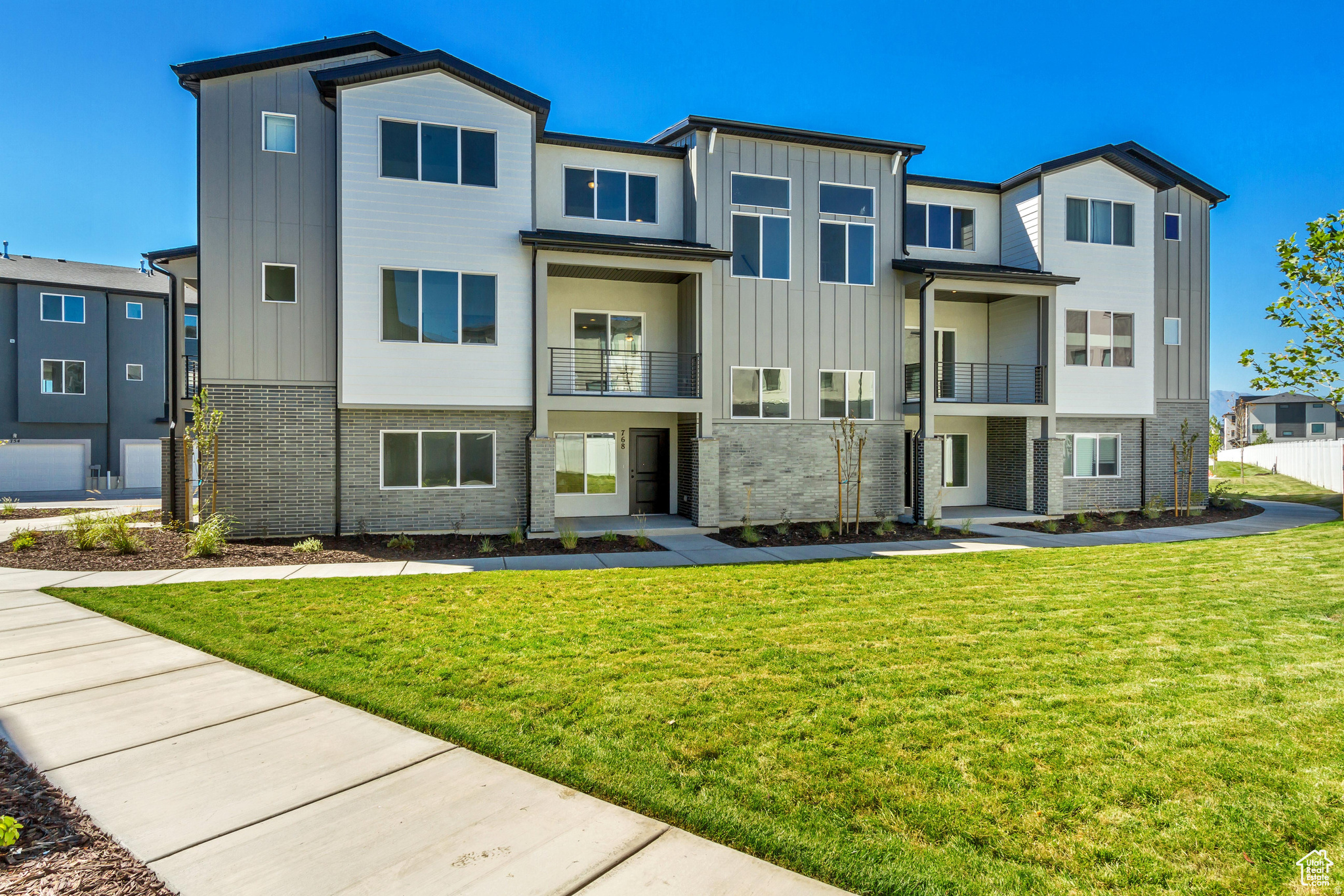 THIS IS IT - Ready this MONTH! The Highgrove from Woodside Homes features a guest bedroom and full bath on the first floor, with a generously sized living room, open to the kitchen and dining, perfect for entertaining. Enjoy the mountain views from the comfort of your covered deck just steps from the dining area. The Primary bathroom has ample counter space and on demand hot water. With upgraded cabinetry, quartz counters, waterproof wood laminate flooring, this thoughtfully designed home is waiting for you to move in! Ask about our incredible preferred lender incentives and special interest rate promotions to help make your dream of home ownership a reality. #435 Highgrove.