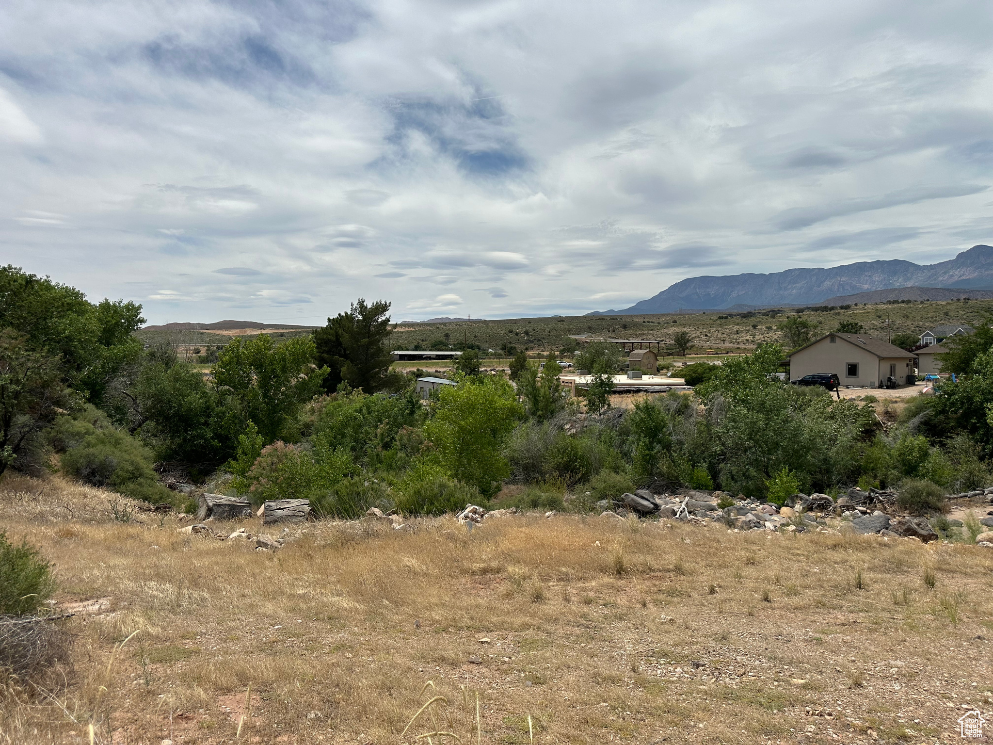 Don't miss out on this rare opportunity nestled along the banks of picturesqe Ash Creek in Toquerville. These 5 lots have unobstructed views and you can bring your own builder!