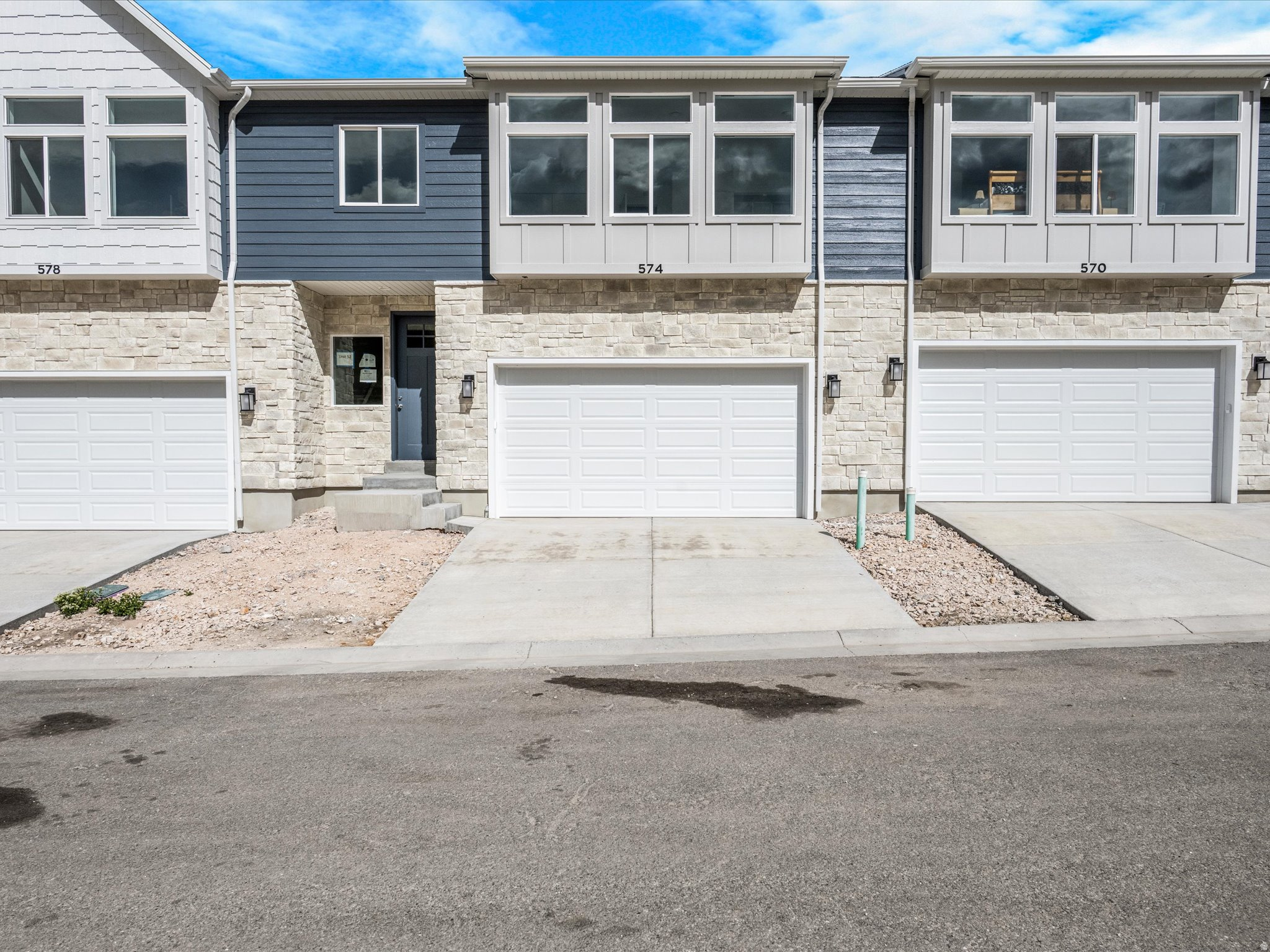 Brand new short term rental approved townhome! Amazing location close to the new marina, grocery store and bike trails. This unit includes a fully finished basement with over 600 additional sq ft to use as a bunk room or 3rd family room. LVP flooring, soft close cabinets and quartz countertops are a few of the great features. On-site RV Parking lot. Don't miss out on your opportunity to own the last unit with a basement!