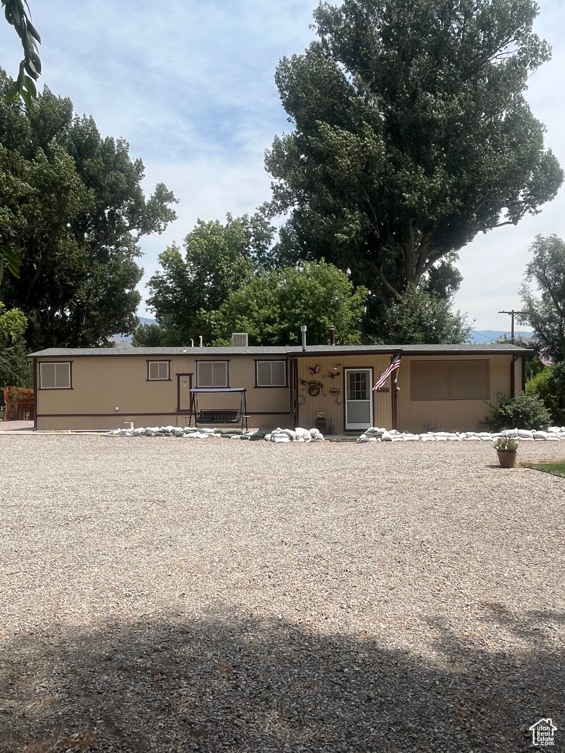 This charming little home is nestled in the beautiful town of Marysvale that everyone either comes to visit and ride side by sides or falls in love with and moves in permanently.  This home is completely fenced in with a sprinkling system and an extra building in the back that can be used for rental property. This property also has an extra water meter in the back corner that makes this property able to be subdivided into two sections or more. There are two sheds in the back that can be used for storage and another that is new that can be used as a shop..  . A great property for a family to live permanently or a second vacation home.. .