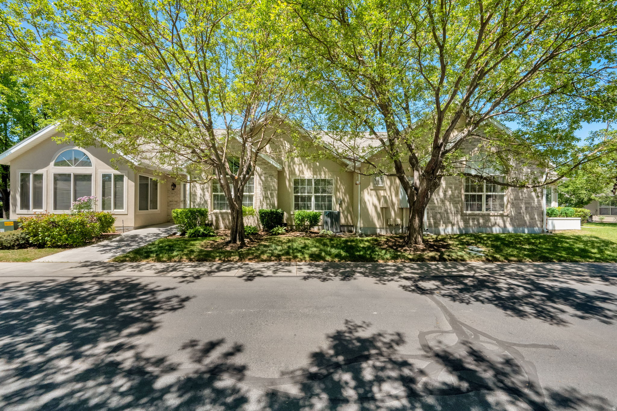 Welcome to easy living in this beautifully maintained and updated one-level condo located in a desirable 55+ community. Perfectly situated near the pool and clubhouse, this home features vaulted ceilings throughout and an open, inviting floor plan designed for comfort and convenience. Enjoy abundant natural light in the bright sunroom, relax in the versatile den that can serve as a home office or third bedroom, Recent updates include a brand new furnace and A/C, newer water heater, and blinds throughout, making this home truly move-in ready. Surrounded by beautifully maintained green spaces and offering exceptional community amenities, including a pool and clubhouse, this is low-maintenance living at its finest. Don't miss the opportunity to enjoy a carefree lifestyle in one of the area's most sought-after 55+ communities.