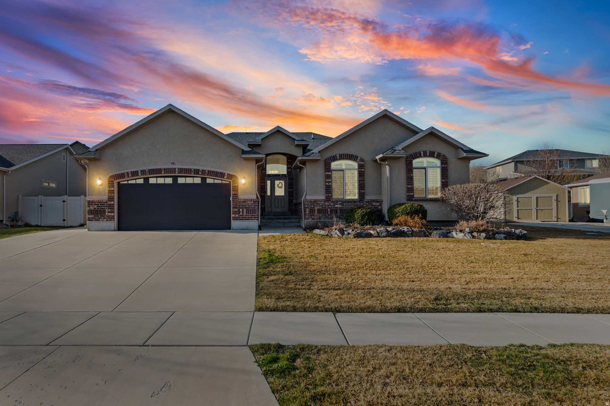 BIG PRICE DROP...NEW CARPET and PAINT For this amazing new home Situated on the quiet north slope of Lake Mountain, this Saratoga Springs home offers a bright and spacious open floor plan with vaulted ceilings and a welcoming tiled entry. The kitchen features knotty alder cabinetry, quartz countertops, a large pantry, and ample counter space, and flows easily into the dining area and living room with a cozy gas fireplace and plenty of natural light. The main floor primary suite includes a large walk-in closet, garden tub, and separate shower. The lower level provides generously sized bedrooms, a large family room perfect for gathering or entertaining, and cold storage. Enjoy the covered back patio with a peek of Mt. Timpanogos, along with an RV pad, storage shed, and space for gardening. The furnace and A/C were replaced in 2022. Located within walking distance to local schools and the Saratoga Springs Utah Temple, and surrounded by trails and parks. Conveniently close to Utah Lake access, TalonsCove Golf Club, and everyday shopping.