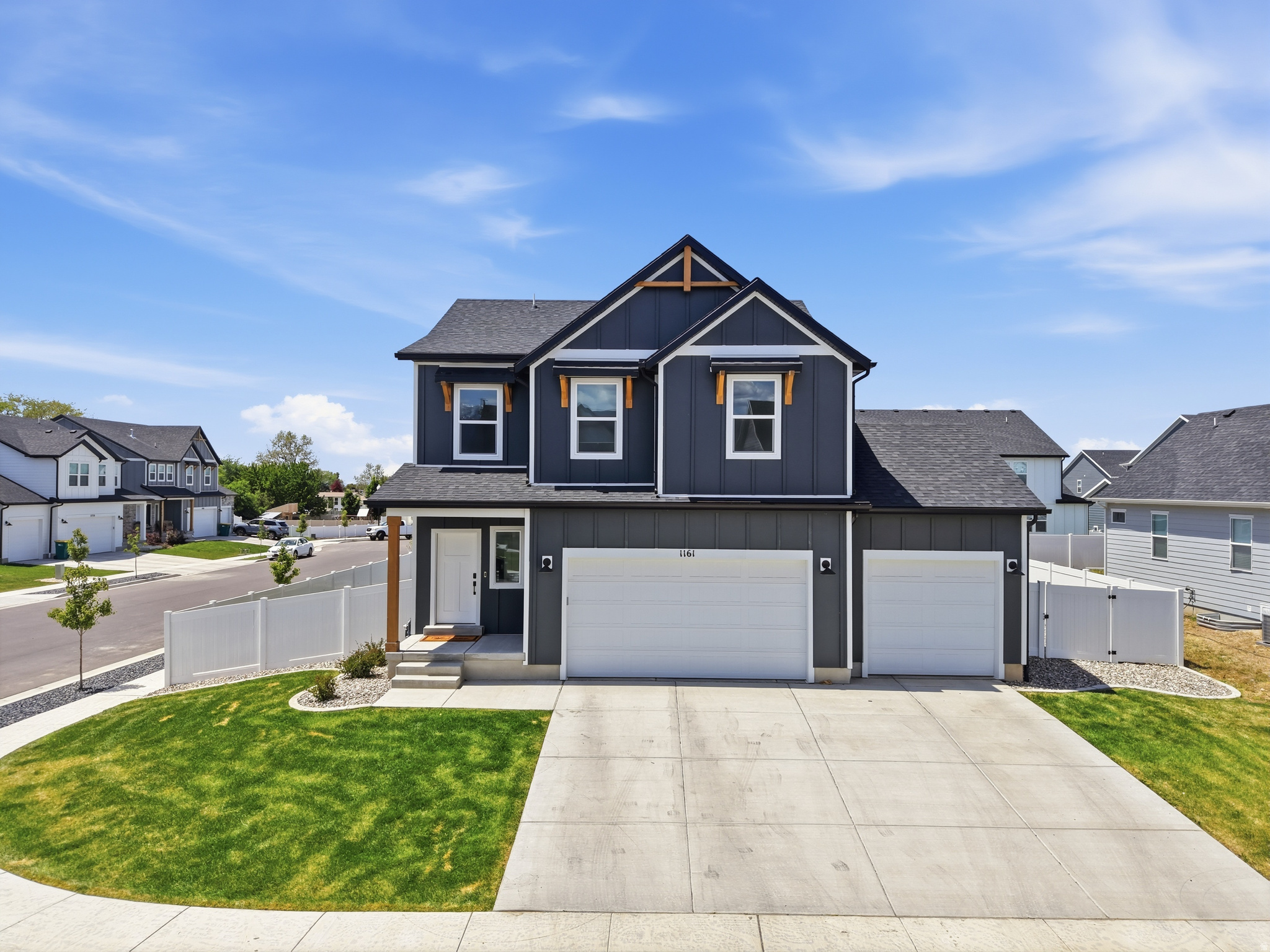 **THIS PROPERTY TO BE FEATURED ON UTAH'S REAL ESTATE ESSENTIALS ON ABC4** This home has been wonderfully maintained, is nearly new, and has upgrades and completed features buyers are looking for without the wait of new construction. On a desirable corner lot, the home was professionally designed to have timeless, traditional finishes.  The fully completed basement adds valuable living space that most newer homes do not, while the completed landscaping and newly installed fence means both the outdoor and indoor work is already done for you. The oversized three-car garage provides more storage, and the spacious corner lot offers plenty of room for additional parking, trailers, or even RV parking if desired. This move-in ready home combines the appeal of newer construction with the convenience of completed upgrades inside and out.
