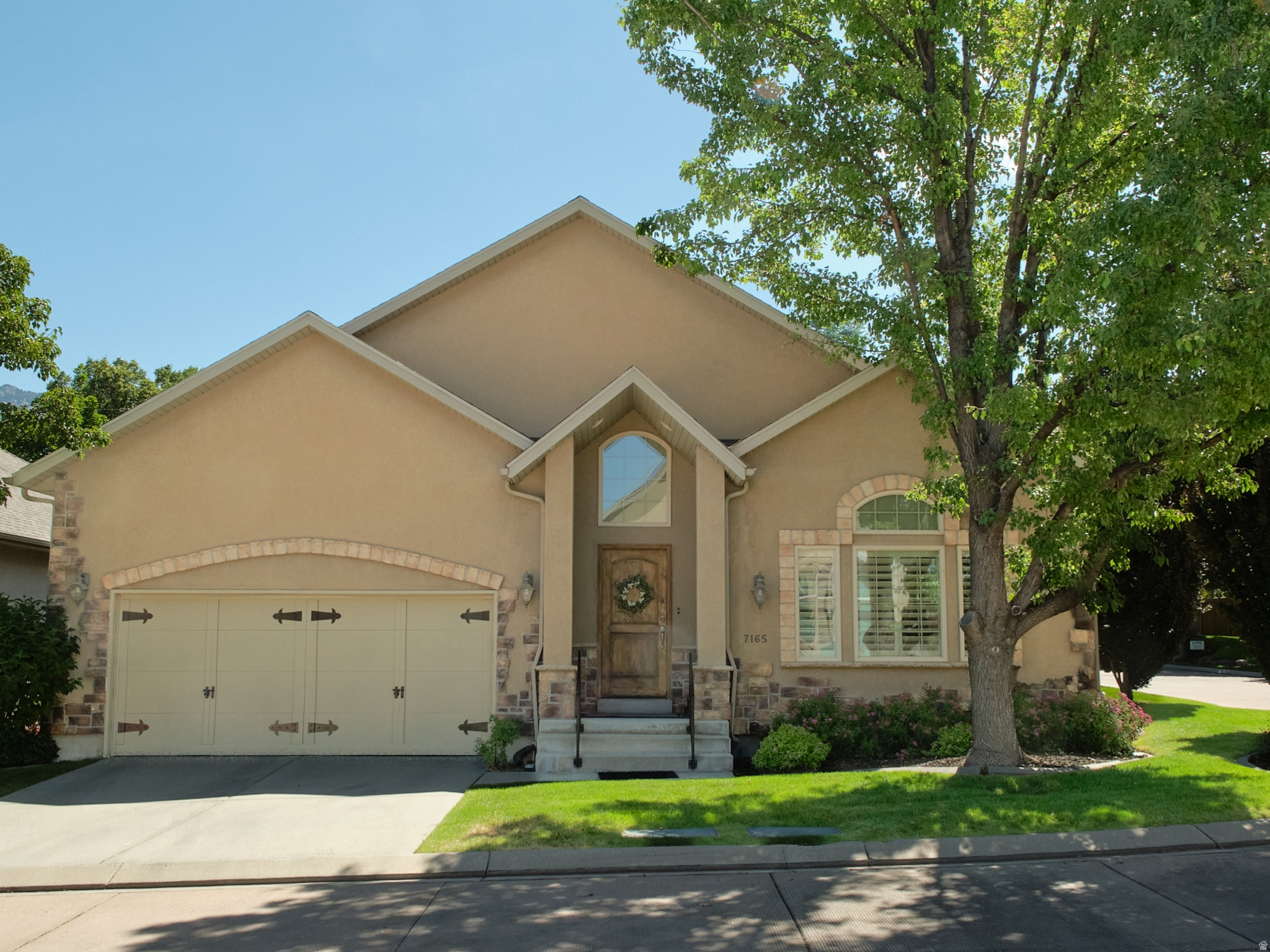 Discover this wonderful main-level living home in a highly desirable gated community, where convenience and tranquility come together perfectly. With easy access to all major shopping destinations and just a quick drive to Utah's world-class ski resorts, this home offers the ideal blend of lifestyle and location. Step inside to find beautiful wood doors & hardwood floors warmed by radiant heat, soaring high ceilings, and an abundance of natural light that fills the spacious, open living areas. Recent updates include a brand-new AC unit, a new roof, and a new soft water system conveniently located under the kitchen sink. Additional peace of mind comes with the installed radon system. Outside, enjoy the beautifully landscaped patio - a perfect spot for relaxing, entertaining, or simply soaking in the peaceful, quiet surroundings. The HOA takes care of all landscaping and mowing, while radiant-heated streets provide added comfort during the winter months. This meticulously maintained home offers comfortable, low-maintenance living in one of the most convenient locations around. Whether you're looking for a peaceful retreat or an active lifestyle base near shopping and recreation, this property is ready for you to call it home.
