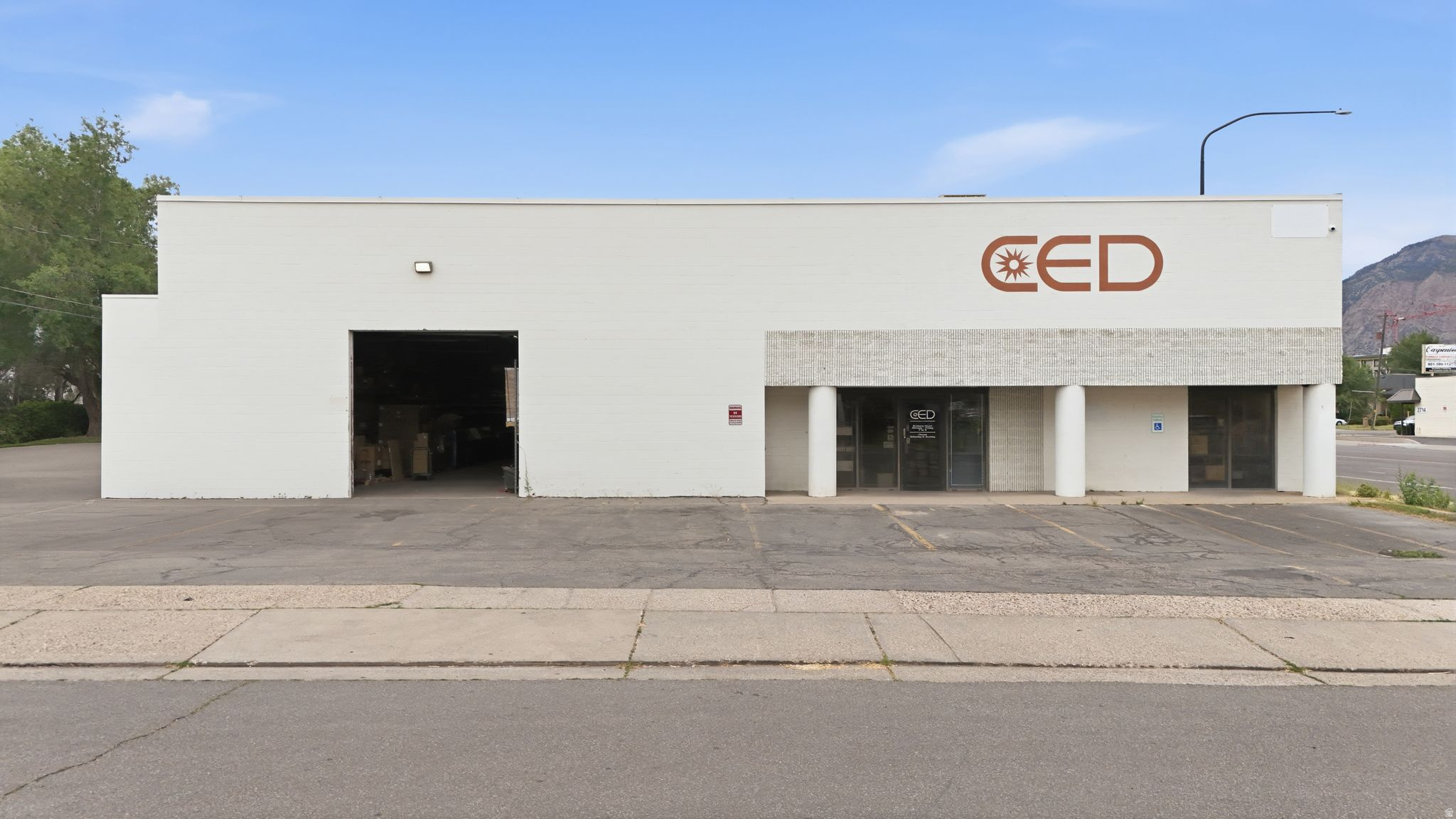 Strong owner/user opportunity positioned along highly trafficked Wall Avenue in Ogden. This versatile office/warehouse property features two warehouse sections with approximately 18' clear height, block construction, and four 12' x 12' grade-level roll up doors allowing for efficient loading, storage, manufacturing, distribution, or contractor operations. The current tenant is expected to vacate, creating an ideal opportunity for an owner/user to occupy the property or for an investor to reposition and secure new tenancy in a highly visible commercial corridor.  Located within Ogden's Community Commercial zoning district, the property offers flexibility for a wide range of permitted commercial and light industrial uses including contractor shops, distribution, showroom, automotive-related businesses, retail service operations, office users, fitness, medical, flex industrial, and other commercial applications. Excellent access, visibility, and central positioning along one of Ogden's primary north/south corridors make this a rare opportunity for businesses seeking functionality, exposure, and long-term upside. Please do not disturb current tenant without appointment!  Square footage figures are provided as a courtesy estimate only and were obtained from County Records. Buyer is advised to obtain an independent measurement.