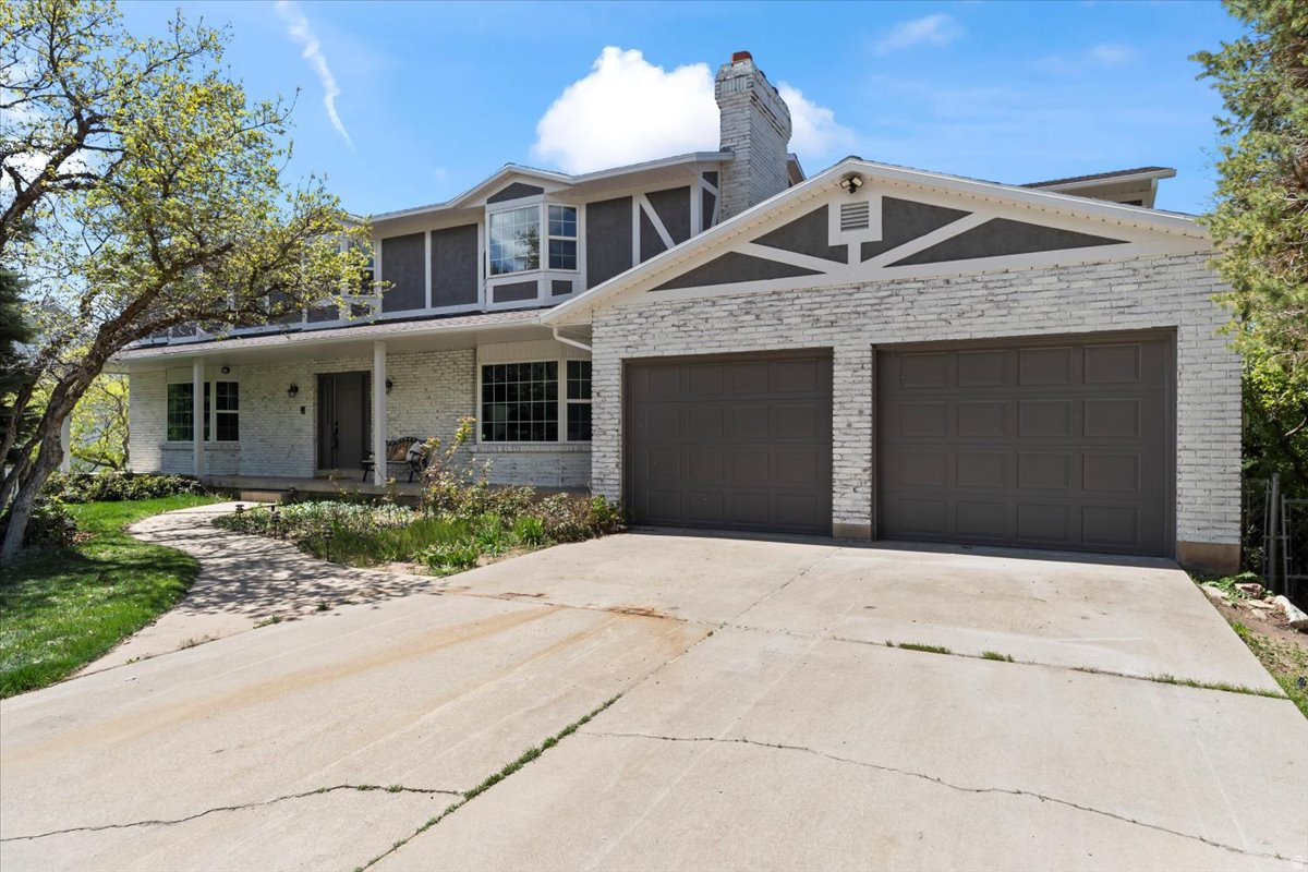 Completely renovated and move-in ready, this stunning 4-bedroom, 2.5-bath home offers modern upgrades throughout in one of Layton's most desirable settings. Situated on a private wooded lot, the property combines updated luxury with exceptional convenience and outdoor access. Inside, you'll find stylish finishes, updated systems, and thoughtfully designed living spaces perfect for everyday living and entertaining.  Retreat to the spacious second floor Master Suite to relax and recharge.  The home also features a spacious 2-car garage, abundant street parking, and an approximately 2,000 SF unfinished basement offering incredible potential for additional living space, a home gym, theater room, or storage. Enjoy quick access to Ogden Valley, Salt Lake City, and Salt Lake International Airport, making this an ideal location for commuters and outdoor enthusiasts alike. Rare combination of privacy, modern updates, and future expansion opportunity.  Square footage figures are provided as a courtesy estimate only.  Buyer is advised to obtain an independent measurement.