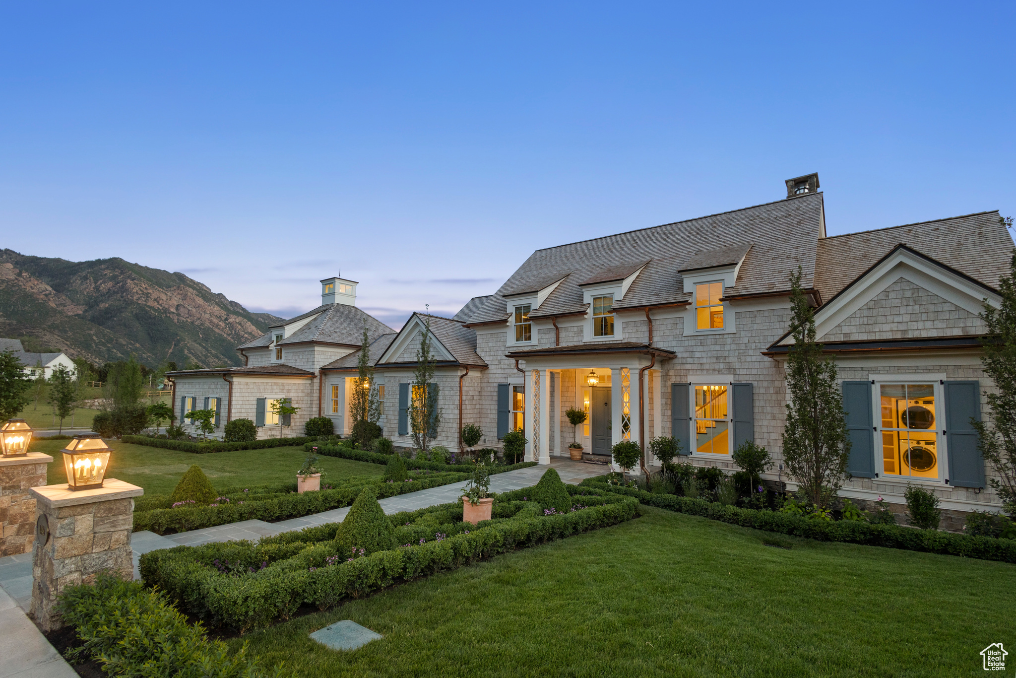 Introducing Palmetto Grove, an exquisitely designed home set in one of the most exclusive neighborhoods in Alpine. This home has been awarded the coveted Judges' Choice Award in the prestigious UV Parade of Homes. The Ridge consists of estate lots that are nestled up against the Wasatch Range with breathtaking views of Lone Peak and Box Elder. Palmetto Grove is a rare classical home, thoughtfully designed by renowned architect C Brandon Ingram and built by Grove Homes. Every detail has been meticulously planned by award-winning designers Alex Adamson for the interior and Emily Brooks Wayment for landscaping. This corner cul-de-sac homesite backs up to the neighborhood park, giving an open feel to a private outdoor living space that will feature a covered patio and gunite pool and spa. The interior will impress with bespoke woodwork and cabinetry, expertly curated fixtures, and intentionally designed living spaces. The wide entryway gives way to an entertainer's great room with three sets of French doors leading to the covered bluestone deck. The large kitchen is a home chef's haven with a La Cornue range, Subzero refrigeration, Cove dishwashers, and walk-through scullery with supplemental Wolf oven and pebble ice maker. An expansive dining room, laundry studio, private study, and primary suite round out the main level. The bonus room above the garage is the perfect spot for a playroom, gaming center, hobby room, or secondary study. The second level leads to three spacious en-suites with walk-in closets and a centrally located study area. Ten foot basement ceilings expand the below-grade space, which feature a glass door gym, three-tier theatre room, recreation area, three additional bedrooms with adjoining bathrooms, and vast storage areas. Full landscaping includes an in-ground pool and spa by California Pools, raised garden beds and full trees lining the property. Do not miss out on the opportunity to call this one-of-a-kind home your own.