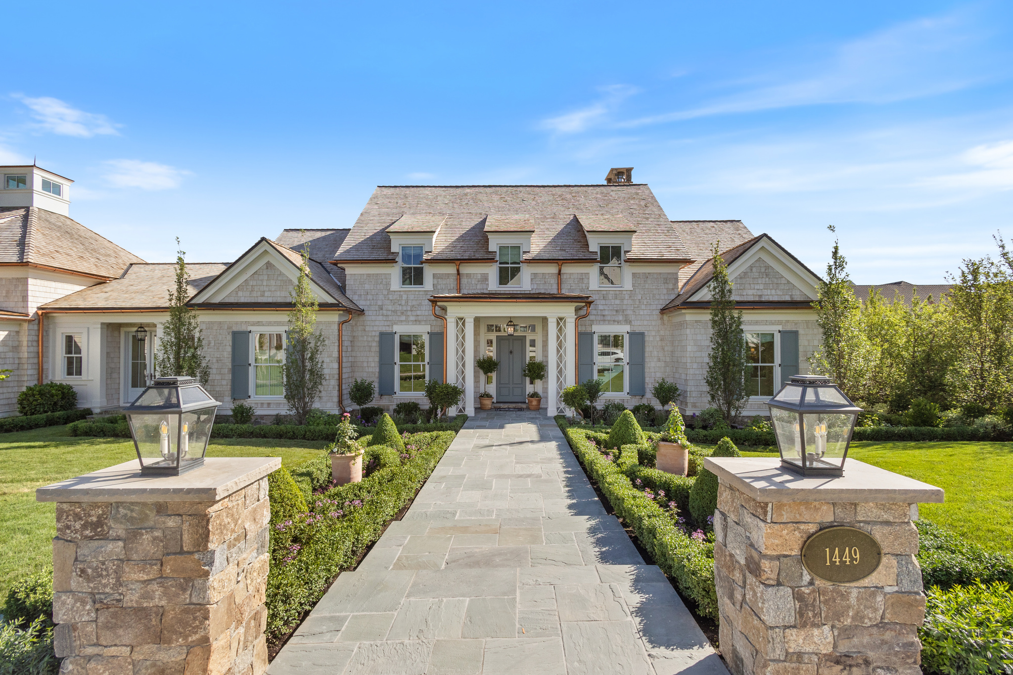 Introducing Palmetto Grove, an exquisitely designed home set in one of the most exclusive neighborhoods in Alpine. This home has been awarded the coveted Judges' Choice Award in the prestigious UV Parade of Homes. The Ridge consists of estate lots that are nestled up against the Wasatch Range with breathtaking views of Lone Peak and Box Elder. Palmetto Grove is a rare classical home, thoughtfully designed by renowned architect C Brandon Ingram and built by Grove Homes. Every detail has been meticulously planned by award-winning designers Alex Adamson for the interior and Emily Brooks Wayment for landscaping. This corner cul-de-sac homesite backs up to the neighborhood park, giving an open feel to a private outdoor living space that will feature a covered patio and gunite pool and spa. The interior will impress with bespoke woodwork and cabinetry, expertly curated fixtures, and intentionally designed living spaces. The wide entryway gives way to an entertainer's great room with three sets of French doors leading to the covered bluestone deck. The large kitchen is a home chef's haven with a La Cornue range, Subzero refrigeration, Cove dishwashers, and walk-through scullery with supplemental Wolf oven and pebble ice maker. An expansive dining room, laundry studio, private study, and primary suite round out the main level. The bonus room above the garage is the perfect spot for a playroom, gaming center, hobby room, or secondary study. The second level leads to three spacious en-suites with walk-in closets and a centrally located study area. Ten foot basement ceilings expand the below-grade space, which feature a glass door gym, three-tier theatre room, recreation area, three additional bedrooms with adjoining bathrooms, and vast storage areas. Full landscaping includes an in-ground pool and spa by California Pools, raised garden beds and full trees lining the property. Do not miss out on the opportunity to call this one-of-a-kind home your own.