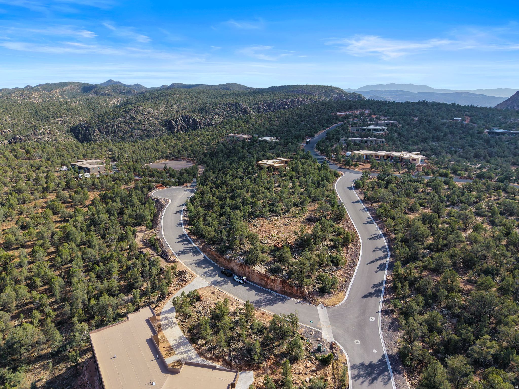Tucked away in the scenic hills of Dammeron Valley, this elevated .93-acre homesite in Pinion Hills offers the perfect blend of privacy, natural beauty, and breathtaking views. Surrounded by mature trees and native landscape, this wooded lot captures sweeping views of the valley below while enjoying cooler temperatures than nearby St. George. Wake up to peaceful mornings, crisp mountain air, and the frequent sight of local wildlife including deer, quail, and other native birds roaming through the area. Whether you're looking to build a full-time residence or a quiet getaway, this rare property offers the serenity and scenery that make Dammeron Valley so special.