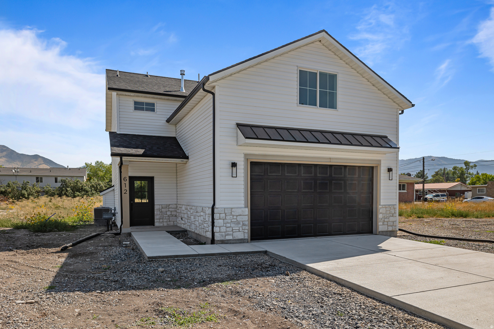 Come see this well-designed 3 bed, 2.5 bath home in a prime Logan location. This home makes great use of space with an open, functional layout, a cozy fireplace in the living area, and a spacious kitchen featuring custom hardwood cabinetry. Upstairs offers three generously sized bedrooms, including a comfortable primary suite with a large walk-in closet. Situated on 400 W facing a well-kept public park, you get open views and extra space without the upkeep-while still being close to everything Logan has to offer! Offering 1% in seller's concessions when using our preferred lenders.