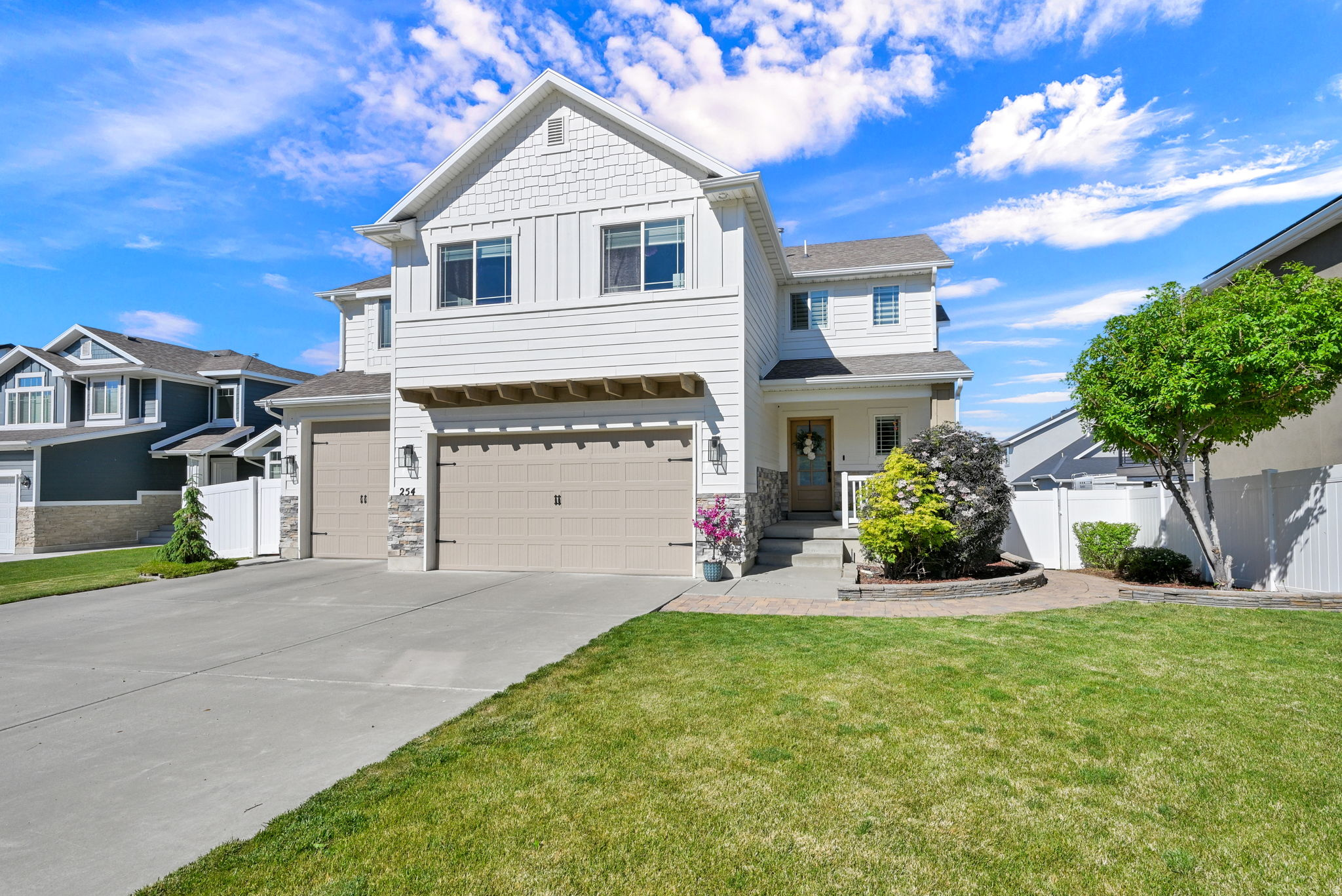 Welcome to this bright, spacious, and beautifully maintained home in Layton, adjacent to Kaysville. This stunning home offers six bedrooms, four of the bedrooms are collocated on the top floor, with a spacious common area.  There are four bathrooms, beautiful flooring, a spacious kitchen, and an open floor plan designed for comfortable living and entertaining. Enjoy breathtaking mountain and lake views while benefiting from easy access to Highway 89 and I-15. This meticulously maintained home includes valuable upgrades and features, including outright owned solar panels, a new water heater installed in 2024, fresh exterior and interior paint completed in 2024, and a new inverter installed in November 2023. A furnace humidifier has also recently been added for enhanced comfort throughout the year.  This home also includes a Rachio smart sprinkler system, Phillips Hue smart outside lighting, and Chamberlain smart garage doors.  Everything you need is within reach - close to schools, grocery stores, shopping, and dining.  Quick 25 min trip to Ogden or Salt Lake City.  The beautifully landscaped yard features several garden boxes and a lovely deck, perfect for peaceful mornings or relaxing evenings. With a four-car garage, generous closet space, and abundant storage throughout, this home truly offers the best of both worlds: convenience to everything while nestled in a quiet, secluded neighborhood.