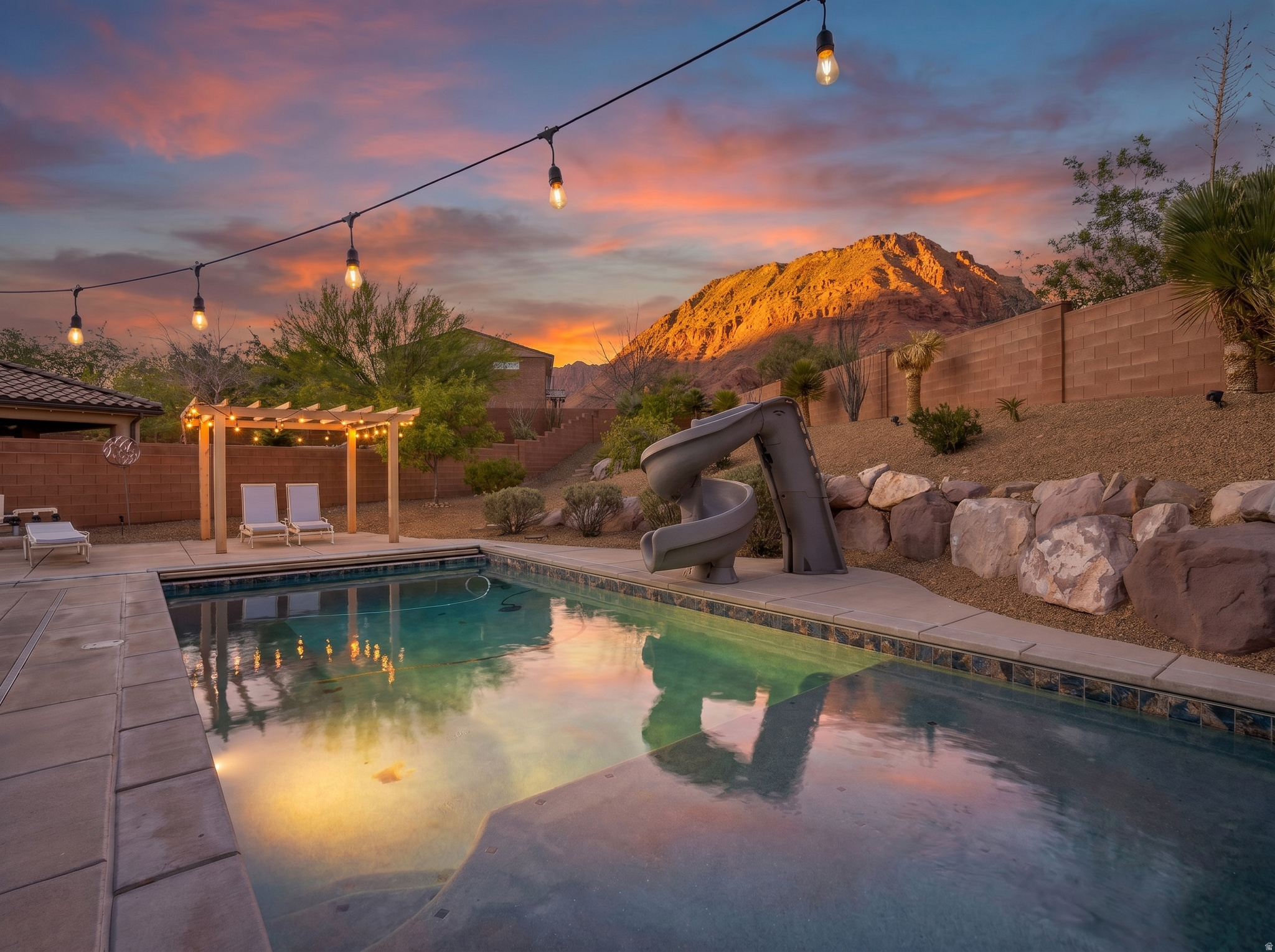 Welcome to this exceptional home in the highly sought-after Talon Cove community of Ivins. Ideally located near Black Desert Resort and Snow Canyon State Park, this property offers the perfect blend of comfort, scenery, and the Southern Utah lifestyle. Set on the largest yard in the community, the backyard is designed for both relaxation and entertaining, featuring a private pool, expansive outdoor space, and a perfectly shaded patio in the afternoons. Enjoy breathtaking red rock views right from your backyard, creating a setting that is both peaceful and unforgettable. Inside, the home features a bright, open floor plan with spacious living areas and abundant natural light. The kitchen flows seamlessly into the main living space, making it ideal for gathering and entertaining, while the primary suite offers a comfortable retreat. The home is being sold nearly fully furnished, creating a rare turnkey opportunity so you can move in and start enjoying it right away. Whether you are looking for a primary residence, second home, or investment property, this home offers an unbeatable combination of space, privacy, convenience, and iconic Southern Utah views.