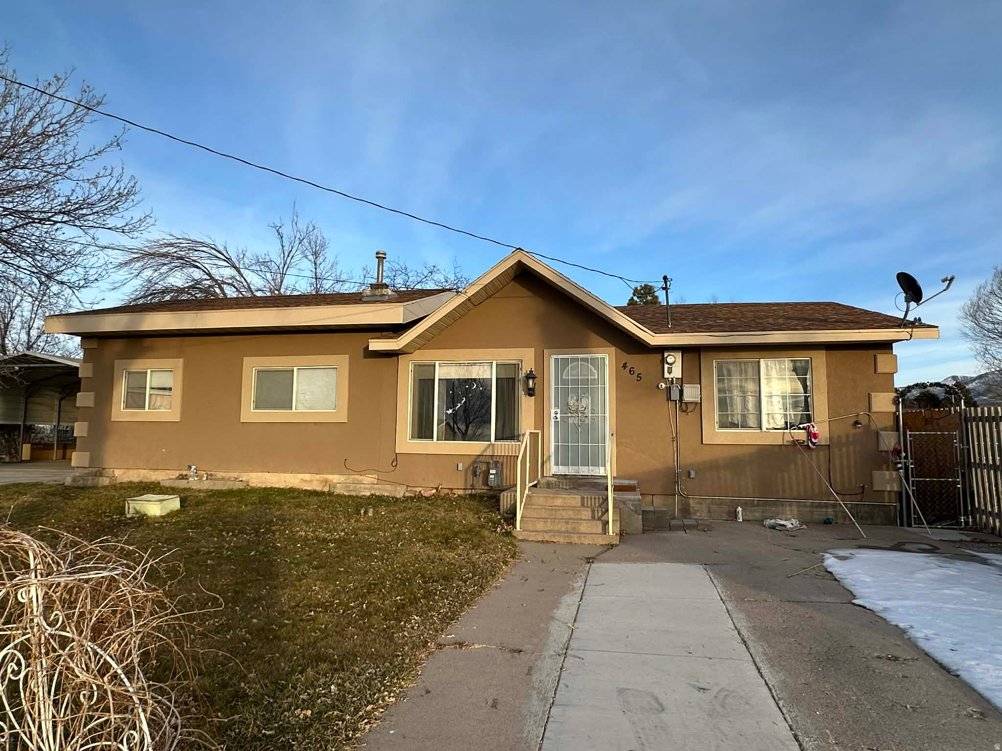 Charming rambler offering 4 bedrooms and 2 bathrooms, perfect for comfortable family living. This home features a spacious open kitchen, dining, and living area, along with dedicated office space-ideal for working from home. Step outside to a large covered patio overlooking a private, fully fenced backyard filled with mature shade trees, grapevines, fruit trees, and a beautiful garden area. The property also includes a shop, garden shed, and detached carport, with plenty of room for RV and ATV parking. A wonderful family home with space, privacy, and versatility both inside and out.