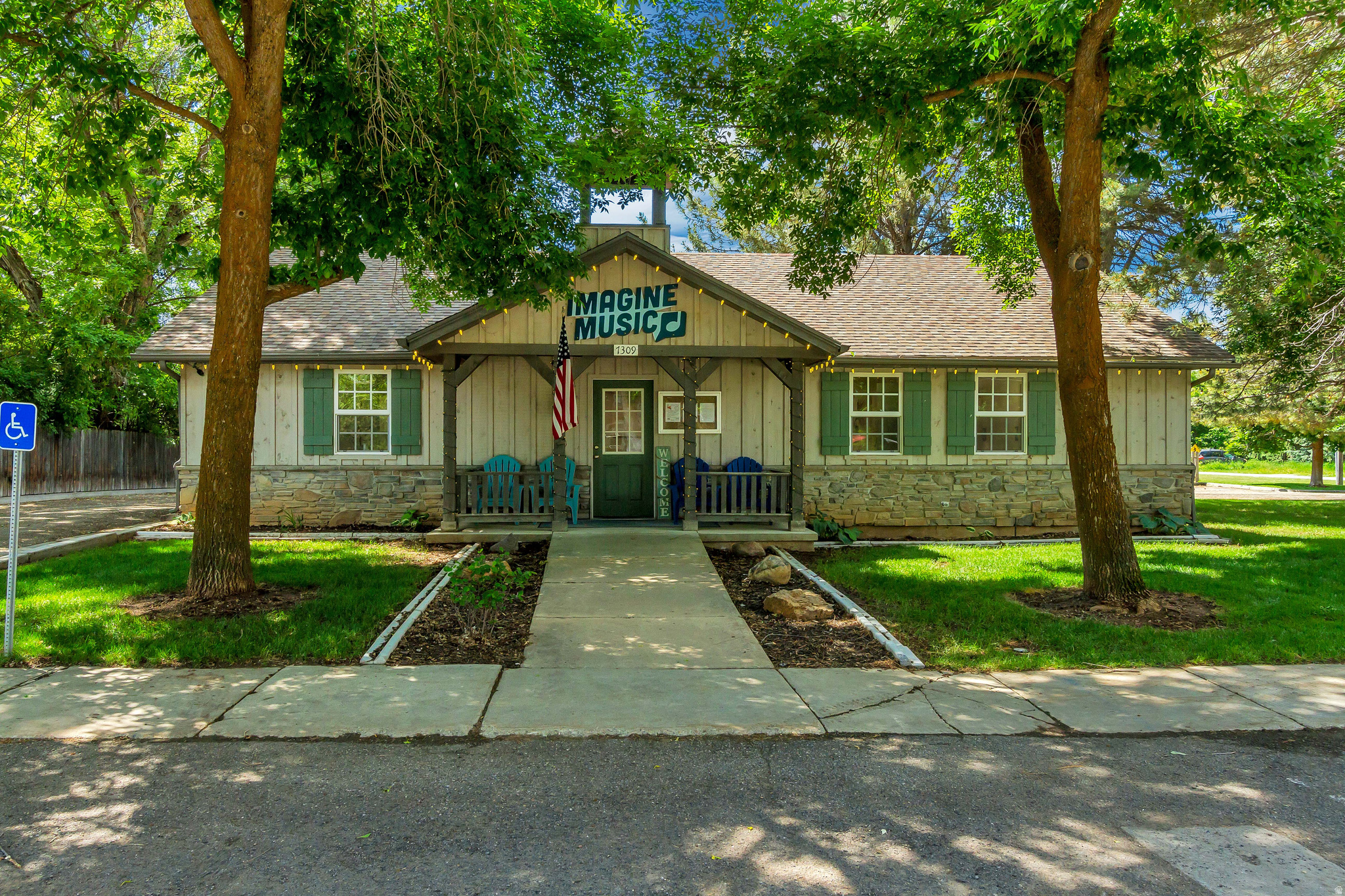Rare opportunity in the heart of Huntsville to own a -acre mixed-use parcel with both residential and commercial zoning-a combination that is increasingly hard to find in the Ogden Valley.  Originally built as Huntsville's Town Hall, this unique property has been thoughtfully updated and most recently operated as a boutique music school and event space. The existing structure offers immediate usability with a large open main room, dedicated office area, multiple private rooms, two half baths, and expansive basement storage.  What truly sets this property apart is its flexibility. With its dual zoning designation, the next owner has the option to continue commercial use, create a live/work environment, or explore future residential conversion (buyer to verify all uses).  The -acre lot is fully landscaped with mature trees, automatic sprinklers, and ample on-site parking both in front and behind the building-offering room for expansion, reconfiguration, or long-term redevelopment.  Positioned in a prime central location within Huntsville and just minutes from the Snowbasin corridor, this property offers not only immediate functionality but also long-term upside in one of Northern Utah's most desirable and supply-constrained markets. Standalone, flexible-use properties like this rarely come available.  Buyer to verify all information, zoning, and potential uses.