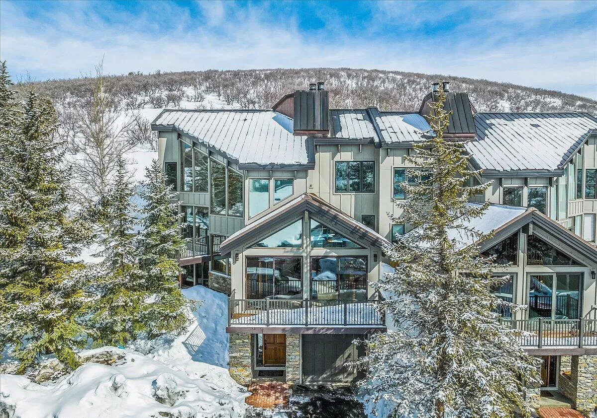 Welcome to Pinnacle 1279, a delightful four-bedroom townhome designed for effortless ski living in the heart of Park City. Whether you're first chair or last run, this mountain retreat offers the ideal balance of comfort, style, and proximity to world-class skiing. The open-concept living space is made for aprs-ski gatherings, with generous seating areas, warm mountain finishes, and an inviting flow, perfect for sharing stories after a day on the slopes. Large windows bring in natural light, and expansive views capture the alpine atmosphere that defines Park City living. Four well-appointed bedrooms provide plenty of space for family and guests, making this home an excellent basecamp for ski weekends and extended stays. Thoughtful design allows for privacy and relaxation, while still accommodating groups with ease. Located on the Deer Valley Shuttle route, only minutes from historic Main Street, and with year-round outdoor recreation on your doorstep, Pinnacle 1279 offers true lock-and-leave convenience with immediate access to powder days, dining, and nightlife. Whether as a primary residence, second home, or investment opportunity, this townhome delivers the ultimate ski-focused Park City lifestyle.