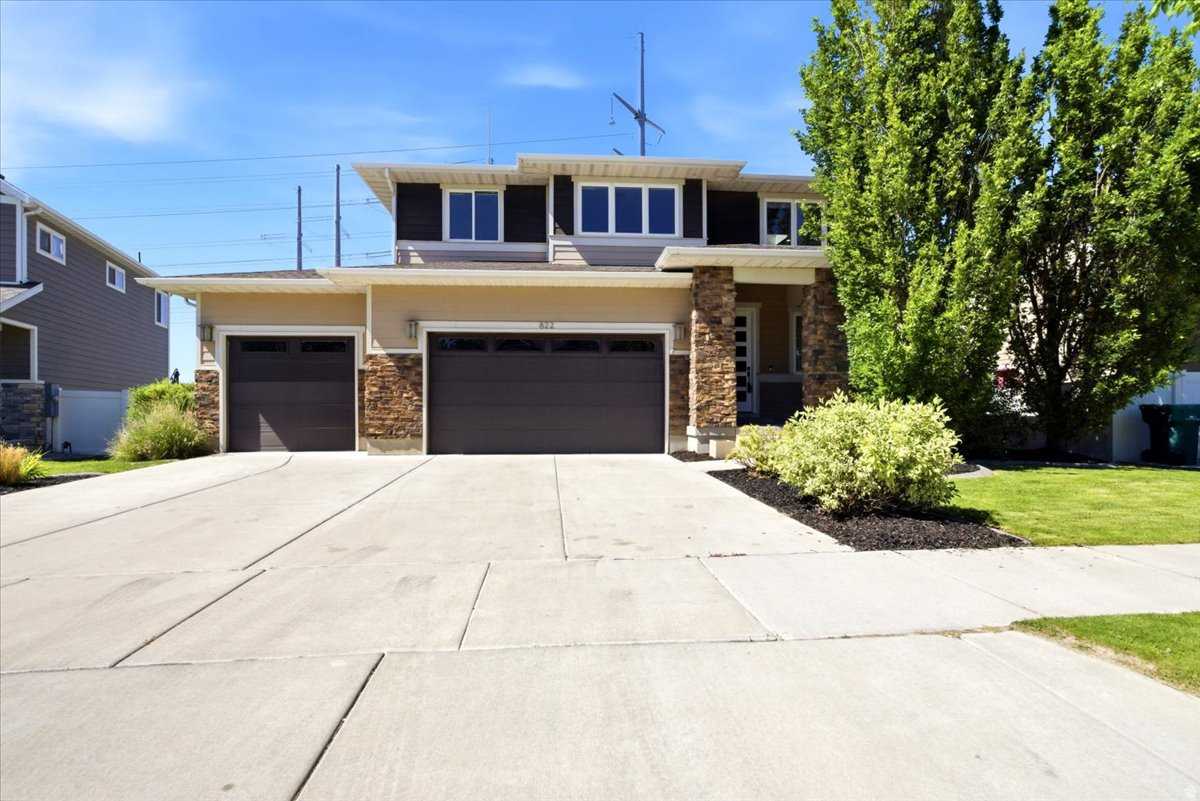 This beautiful home features 5 beds, 3.5 baths, loft and a private office. Beautiful quartz counter tops throughout, brand new carpet and paint, huge 3 car garage, basement kitchenette and multiple skylights! This home was featured in the 2013 SLC Parade Of Homes, and is a MUST SEE with all the incredible upgrades! Ready for a quick move in! Square footage figures are provided as a courtesy estimate only and were obtained from the county. Buyer is advised to obtain an independent measurement.