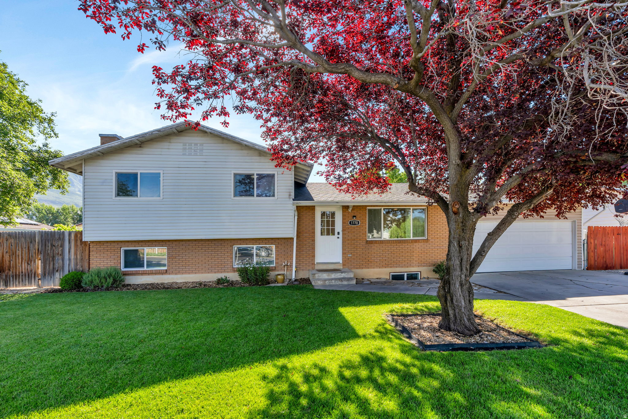 Charming Updated Home in Orem's Bicentennial Estates - 5 Beds, No HOA Welcome to 1770 N 800 W - a beautifully renovated single-family home in the established Bicentennial Estates neighborhood of Orem, Utah. Priced at $541,000 with no HOA, this 5-bedroom, 2-bathroom home delivers 2,140 square feet of move-in ready living at an exceptional Utah County value. Built in 1976 and effectively updated in 2019, the home features a modernized kitchen with built-in dishwasher, countertop range, and disposal, plus durable laminate, tile, and carpet flooring throughout. Double-pane windows and central A/C keep things comfortable in every season. The full walkout basement - 95% finished - nearly doubles your usable space, perfect for a home office, media room, or multigenerational living. Outside, a fully landscaped 0.18-acre lot boasts mature trees, fruit trees, and a patio, while the attached 2-car garage includes a workshop and opener. Zoned for Alpine School District's Aspen Elementary, Oak Canyon, and Timpanogos High School. Minutes from I-15, University Place shopping, SCERA Center for the Arts, Utah Lake State Park, and world-class skiing at Sundance Resort in Provo Canyon.    ***Roof is 1.5 years old!***