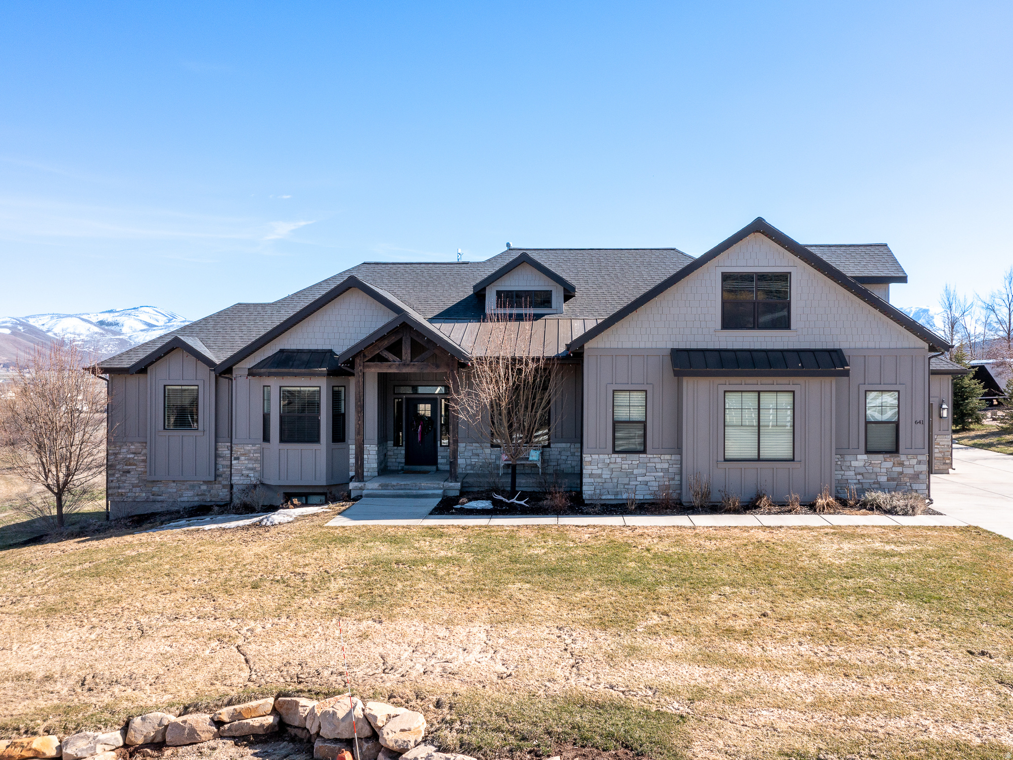 Country living at its "finest"!!! The location of this custom home is in one of the most coveted areas in Utah. This location is very private, with elevated views that are "priceless". Views of Mount Timpanogos is out the back, and overlooking the 'Swiss' town of Midway out the front, and the Heber Valley towards the east. Home sits on a fully landscaped, pristine, 1.17 acre lot on the West bench of Midway. There is room for a barn, or other outbuildings, and or a possible guest-home if desired. There is NO HOA!!!!! This property is horse property, and livestock is allowed. Property is very close to Wasatch State Park with miles of trails out the front door. There's plenty of extra parking in addition to the oversized 3 car garage. Home has timber-framed back and front porches. The home has an extra large party-deck off of the kitchen to entertain guests. A cozy, but large family room is open to the kitchen, and is accented by a beautiful fireplace and extra tall windows overlooking the Heber Valley, and down toward Deer Creek Reservoir. The kitchen is a custom gourmet kitchen with stunning cabinetry, quartz counter-tops, double-oven, extra large stainless refrigerator, and oversized granite island. All main level interior doors are oversized. Home has a custom cathedral ceiling in the family room. A bonus/activity room upstairs with potential for a bunkroom. Many many extras to mention about this home & property. Every inch of the home is custom, and was built by an award winning custom home builder in Utah. Home was built in 2017. This property is close to Soldier Hollow golf course, and a couple of miles north of Deer Creek Reservoir. The property is minutes within 4 major ski resorts, and less than an hour from