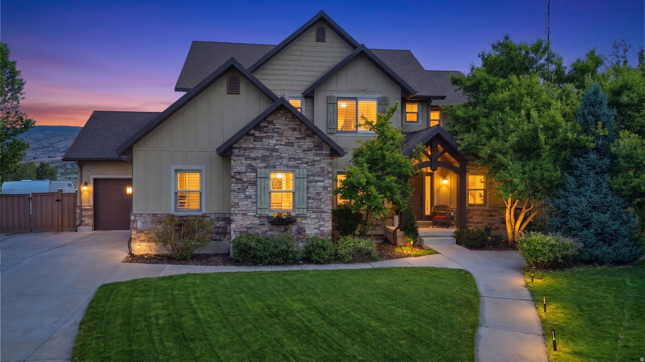 Welcome to an exceptional Heber Valley retreat where breathtaking mountain views, thoughtful design, and quality craftsmanship come together in the highly sought-after Cobblestone neighborhood. Perfectly situated on a quiet cul-de-sac and nestled on a spacious one-third-acre lot, this stunning home offers the perfect blend of luxury, privacy, and mountain living. Located just minutes from world-class destinations like Sundance Resort and Deer Valley, you'll enjoy year-round recreation while coming home to your own peaceful sanctuary. From the moment you step inside, you'll be impressed by the incredible attention to detail, including a beautiful wood and tile inlay foyer, custom built-ins throughout, and elegant hickory hardwood flooring. The spacious great room is designed for gathering and relaxation, featuring a striking double-sided gas fireplace with a custom wood-trimmed mantle that creates a warm and inviting atmosphere. The gourmet kitchen is a true centerpiece of the home, showcasing abundant counter space, a large granite island, stainless steel appliances, and beautifully handcrafted cabinetry. The grand primary suite offers a private escape with stunning mountain views, vaulted ceilings, generous walk-in closets, and a luxurious soaking tub perfect for unwinding after a day of adventure. The fully finished lower level offers incredible flexibility with a separate entrance and a private kitchenette, creating the perfect mother-in-law suite, guest retreat, or potential ADU opportunity. Additional features include whole-home surround sound, impressive ceiling heights, 9-foot basement ceilings, and thoughtfully designed spaces throughout. Outside, the beautifully landscaped backyard transforms into your own private mountain oasis with plenty of room to enjoy the expansive one-third-acre lot. Relax in the hot tub, watch the kids play on the in-ground trampoline or basketball court, gather around the firepit with family and friends, or simply soak in the breathtaking mountain views. This remarkable home truly offers the best of Heber Valley living with exceptional finishes, versatile living spaces, a premium cul-de-sac location, and an unbeatable setting near Utah's premier outdoor destinations.