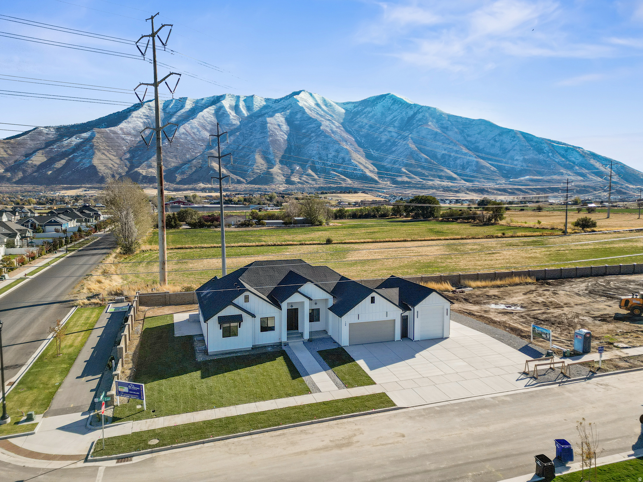 This rare homesite offers the opportunity to build in one of the area's most peaceful and prestigious neighborhoods, surrounded by breathtaking mountain views and located near Maple Mountain High School. With no HOA, no restrictive CCRs, and the freedom to design the home you truly want, opportunities like this are becoming increasingly hard to find. For buyers seeking something exceptional, R5 Homes offers the ability to create a beautifully engineered semi-custom home designed for modern living - including private family suites, multigenerational flexibility, and optional income-producing ADU living spaces. By building with the seller's preferred builder, buyers may realize substantial savings while owning a uniquely designed, high-quality home built for both lifestyle and long-term value. Contact the listing agent for full details and to explore how to maximize the potential of this exceptional property. Ask about the price of the lot if you chose a different builder.