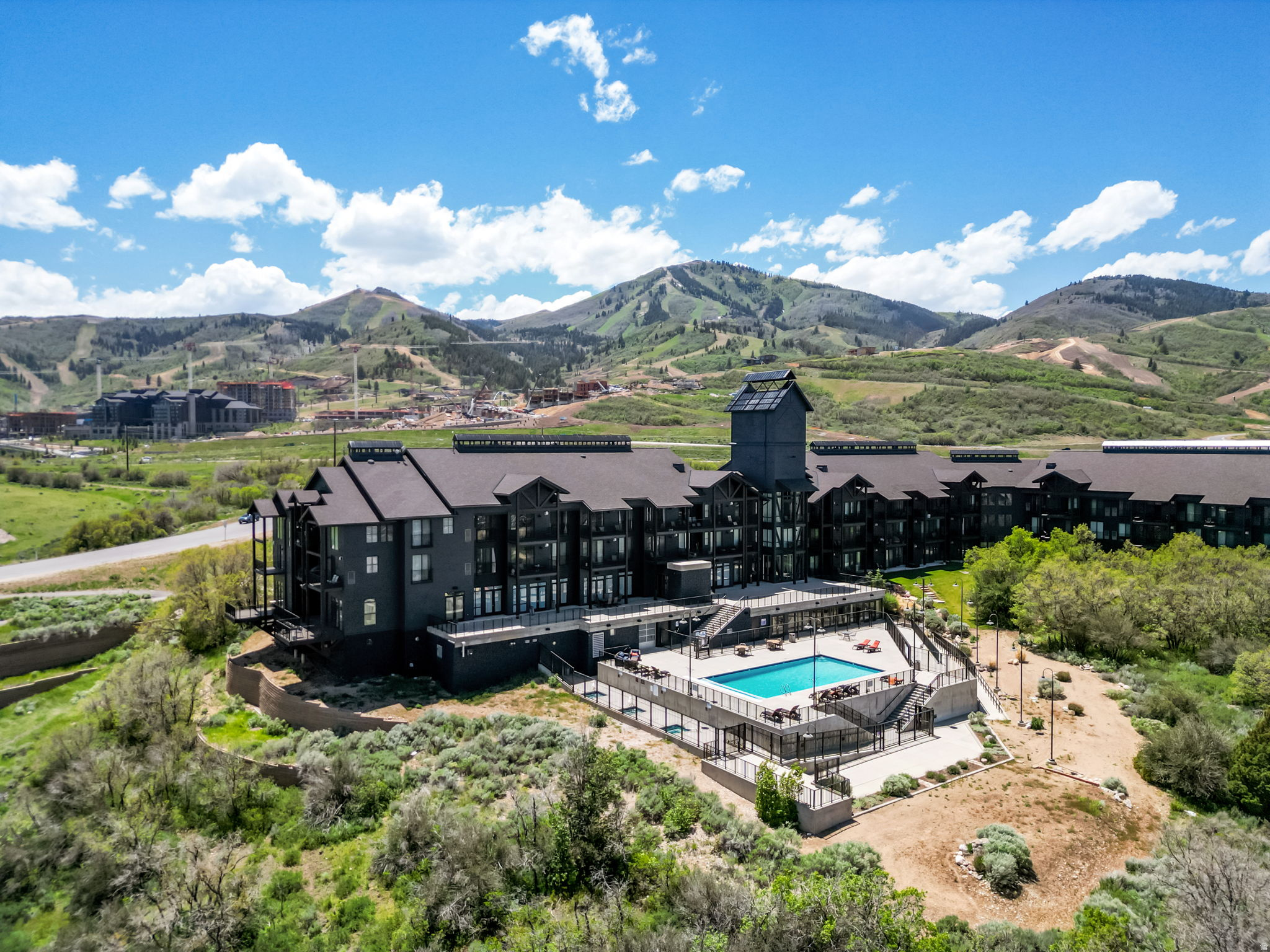 Experience the ultimate four-season mountain retreat at The Mason, formerly known as The Lodge at Stillwater, ideally positioned between Deer Valley East Village and Jordanelle Reservoir. Located directly across from the new East Village Gondola and moments from the marina, this remodeled one-bedroom, two-bathroom condominium offers rare access to world-class skiing, boating, hiking, biking, golf, and year-round outdoor recreation from one exceptional location. Offered fully furnished, the residence features a full kitchen, an open, light-filled living space, an in-unit washer and dryer, a private deck with beautiful views of the Jordanelle Reservoir, and an additional dedicated gear locker conveniently located just outside the unit. Whether you are seeking a personal mountain getaway, investment property, or full-time residence, this property offers outstanding nightly and long-term rental potential. Owners and guests enjoy an impressive collection of resort-style amenities, including a heated outdoor swimming pool, multiple year-round hot tubs, a fitness center, a game room with billiards, secure underground parking, meeting and conference facilities, and a year-round on-site outfitter. As part of The Mason's ongoing transformation, future enhancements are anticipated to include elevated common spaces and planned food and beverage offerings, such as a restaurant and bar. The Mason is undergoing a thoughtful resort reimagination featuring updated interiors, refined mountain design, and modernized amenities throughout the property. Ideally located just off Highway 40 and minutes from Deer Valley East Village, Park City's iconic Main Street, fly fishing on the Provo River, shopping, dining, and entertainment, this is an incredible opportunity to own in one of the area's most exciting and evolving resort communities. Adventure begins the moment you arrive.