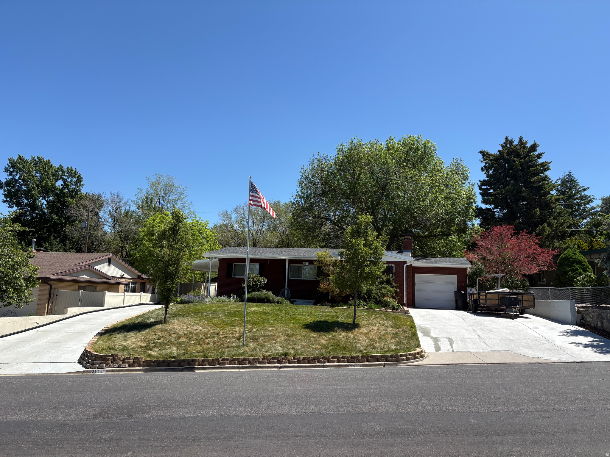 Beautiful 5-Bedroom Rambler in Prime Bountiful Location This spacious 2,300 sq ft, 5-bedroom, 2-bath rambler offers the perfect blend of comfort, convenience, and charm-located just 10 minutes from downtown Salt Lake City in a wonderful Bountiful neighborhood. Enjoy the feel of small-town living with easy access to big-city amenities. Situated on an impressive 0.26-acre lot, the property features a fully shaded, private backyard-ideal for relaxing or entertaining. The outdoor space includes a large patio, mature landscaping, garden area, fire pit, flower beds, and two storage sheds. A full sprinkler system with secondary water keeps everything lush and low-cost to maintain. Inside, the home offers a warm and inviting layout with a cozy fireplace, central air, and a mix of new and classic finishes. Recent updates include a new roof (2023), brand-new furnace, water heater, sewer line, and water line-providing peace of mind for years to come. Fresh paint and new carpet are complemented by original hardwood floors and tile accents throughout. Additional features include a 1-car garage, carport, and two driveways-one with ample space for RV or trailer parking. Located in a highly desirable area, Bountiful is known for its top-rated schools, beautiful surroundings, and lower utility costs.