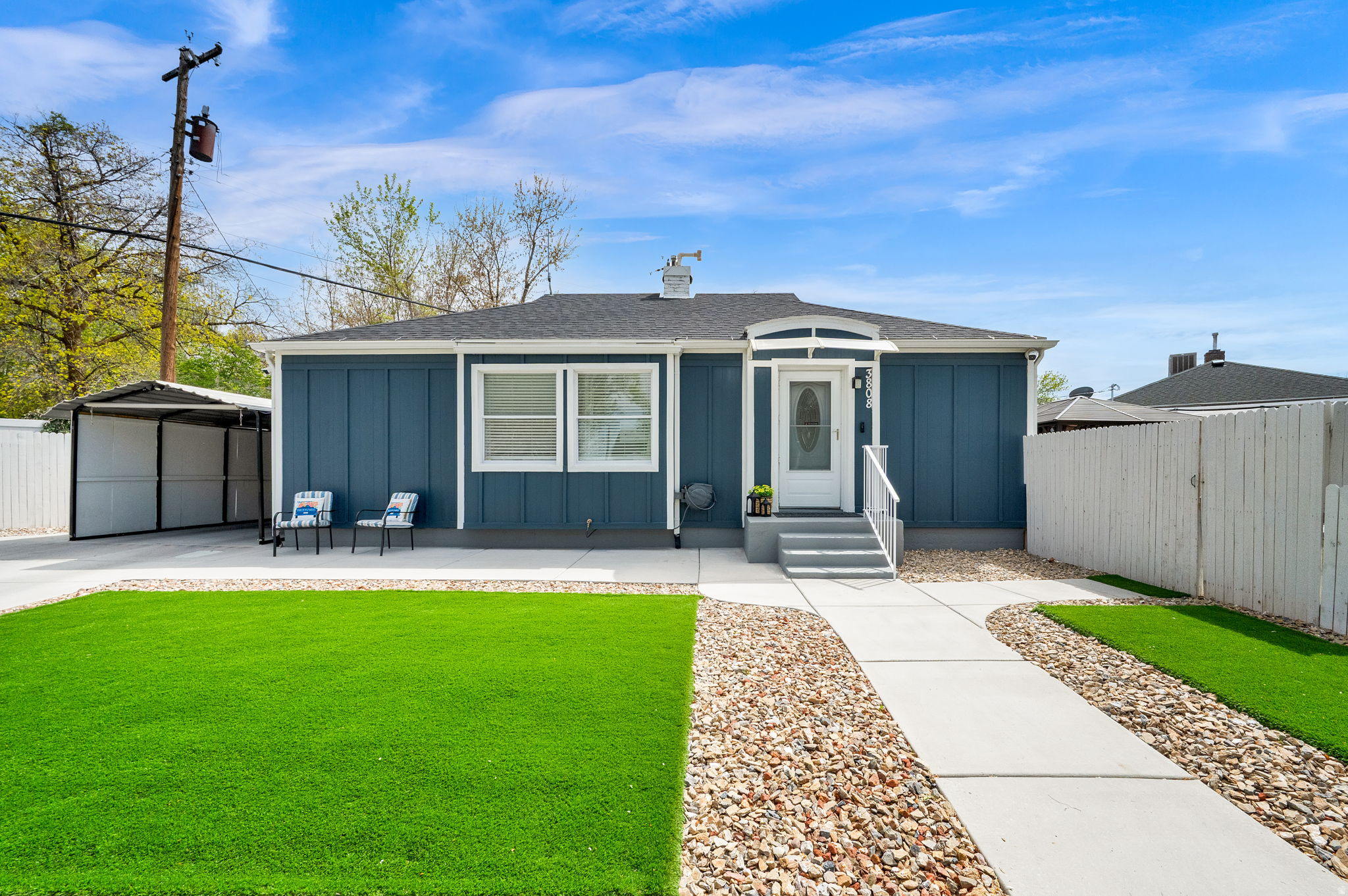 This inviting rambler offers three bedrooms on main level and one additional bedroom downstairs, giving you plenty of space for living, hosting and relaxing. Room to add a second bathroom in the lower level.  The home features newer kitchen cabinets, beautiful granite countertops and stainless steel appliances creating a kitchen that is both stylish and highly functional.  Major updates include Roof (2020), Water Heater (2022), Furnace (2018), Water Softener (2023), Electrical Panel (2024).  Outside, you'll appreciate the portable carport for covered parking, RV space, and a fully fenced backyard perfect for pets, play or gatherings as well.  All backyard play toys and gazebo included. Added bonus a EV Charger in carport area installed in 2024.