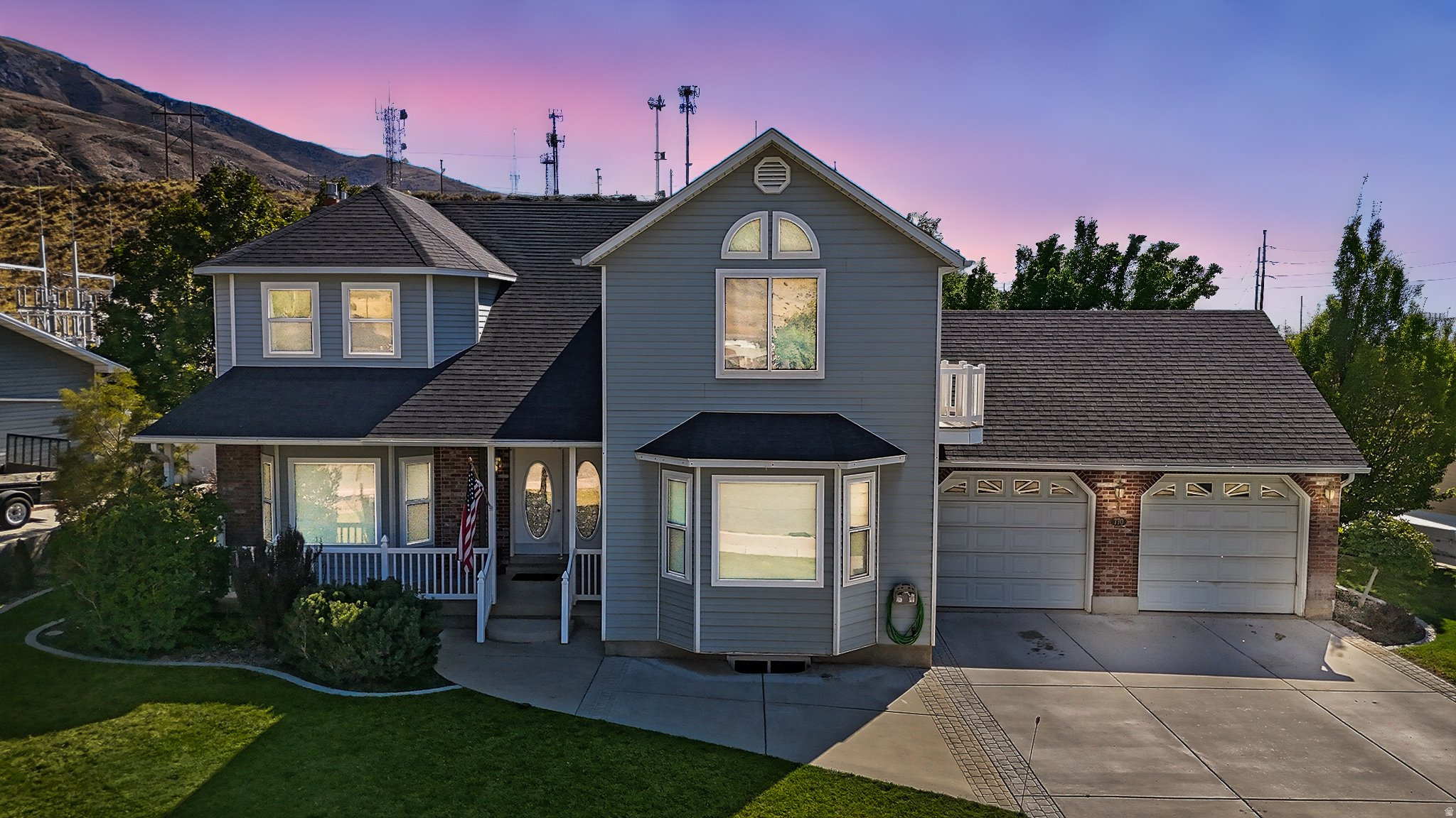 Sellers will contribute $10000 in concessions with a full price offer! Discover this stunning 2-story home offering 4,321 sq. ft. of beautifully designed living space with 6 bedrooms and 4 bathrooms, perfectly situated on a .28-acre fully fenced lot. Surrounded by mature landscaping and fruit trees-including peach, cherry, and American sweet crabapple-the backyard provides both beauty and functionality.  Inside, the home is thoughtfully designed for comfort and efficiency with three furnaces (one for each level), two A/C units, and two gas-log fireplaces, each with its own thermostat. The spacious kitchen is a dream for any home chef, featuring custom cabinetry, granite countertops, and a double gas range.  The owner's suite offers a private retreat and even includes a convenient laundry chute, while multiple living areas provide ample space for gatherings and everyday living. The basement has been freshly painted, adding a bright and updated feel to the lower level.  Step outside to a covered composite deck, perfect for entertaining or relaxing while enjoying the landscaped yard and mountain views. Additional highlights include new carpet on the main and upper levels (2022), a 2-car garage with 220V power, and a roof replaced within the last 10 years.  The home also features a privately owned trunk line for fiber optics, eliminating the need to rent equipment from a provider. Conveniently located with easy access to downtown Brigham City and Sardine Canyon, this home blends thoughtful updates, space, and timeless comfort-ready to welcome its next owners.
