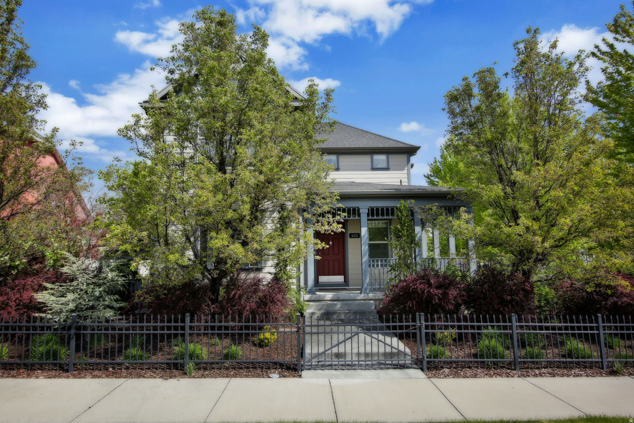 Nestled along nearly 2,000 feet of open park space in Daybreak, this 5-bedroom home offers a rare blend of light, flexibility, and connection to the outdoors. Windows flood the main and upper levels with natural light, creating a warm, inviting feel throughout. The home features thoughtfully designed living spaces, including a spacious basement ideal for movie nights, along with unique accent walls that add character to several bedrooms. Step outside to enjoy both dedicated outdoor dining and separate lounging areas-perfect for entertaining or quiet evenings at home. A standout feature is the apartment above the oversized 2.5-car garage, complete with its own private entrance-ideal for guests, rental income, or multi-generational living. Located in the heart of Daybreak, you'll enjoy unmatched community amenities including pools, fitness center, tennis and pickleball courts, miles of biking trails, summer concerts, and even Salt Lake Bees baseball. With over 3k sq ft of living space, this home & ADU offers both comfort and opportunity for growth.