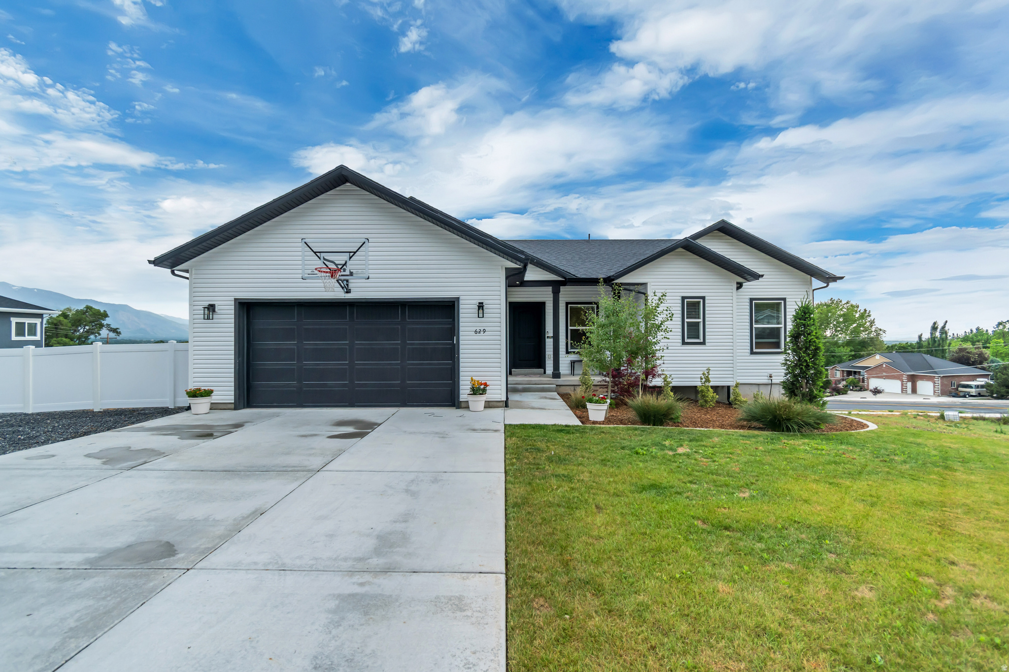 This home is the reason that they call the town Pleasant VIEW.  Sitting in the shadow of Ben Lomond Mtn with breathtaking views from Mount Ogden and Antelope Island all the way down to the mountains outside of Salt Lake and everything in between.  Not to mention 3 parks within walking distance, 20-30 minutes to hiking and skiing this home has the location and views locked down.  Step in the home and enjoy the views from your kitchen sink or one of two outdoor areas, daylight basement with 9.5' ceiling, walk in pantry, tankless H2O etc.  Lastly, with a .5 acre lot, you have plenty of room for all of your toys and storage.  Far too much to list here, you'll just have to stop by and see for yourself! Square footage figures are provided as a courtesy estimate only and were obtained from county records.  Buyer is advised to obtain an independent measurement.