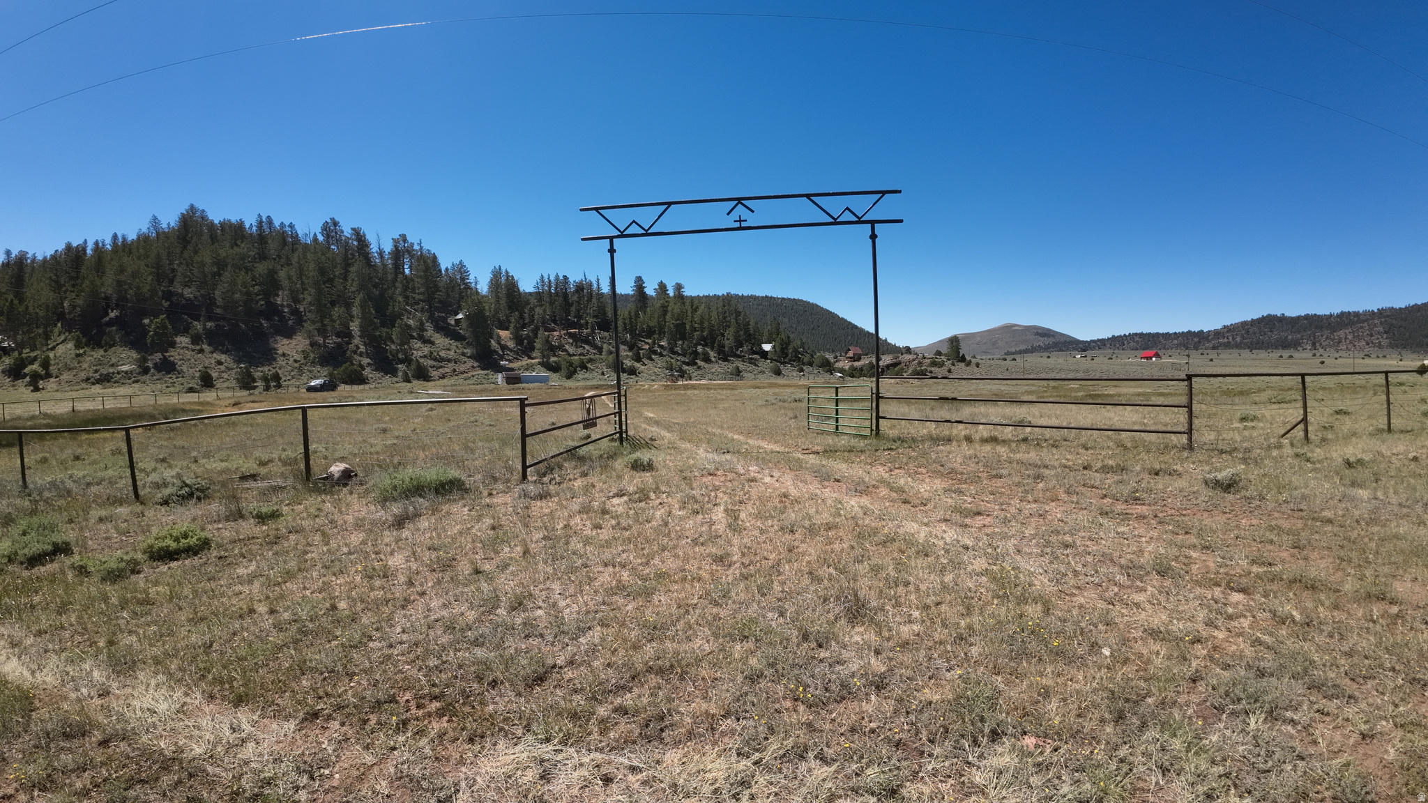 This is a one-of-a-kind property located at Pot Creek on Diamond Mountain - 10 acres of beauty await you!  4 bedroom cabin with 3 trailer parking spots - 2 septic tanks and a well.  This cabin is in perfect condition and ready for its next owner.  Furnishings included! Buyer to verify all information.  This won't last long as there is not another like it!