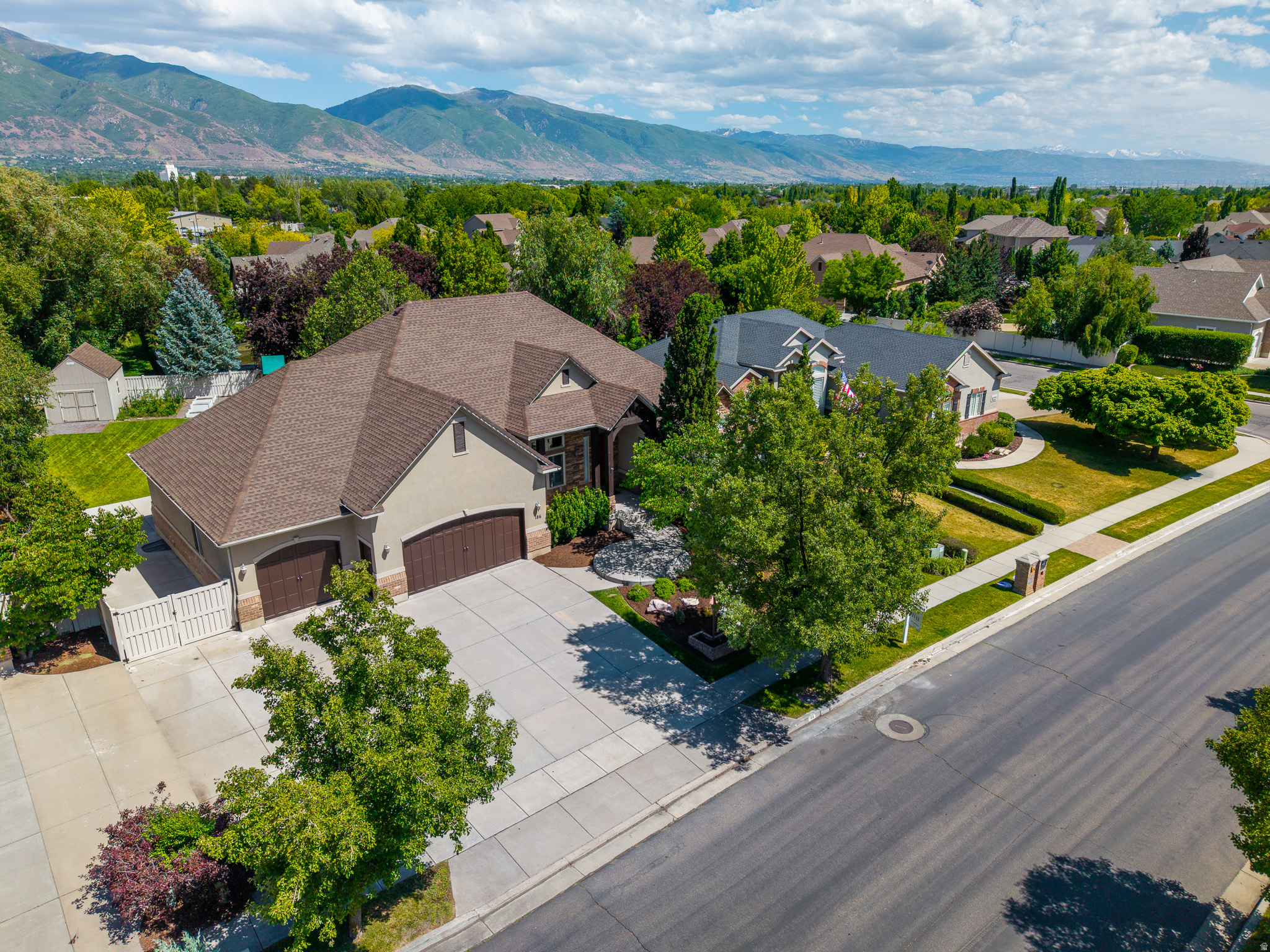 BEST VALUE IN THE NEIGHBORHOOD!!**NEW PRICE IS LOWER THEN ANY HOME LIKE IT IN KAYSVILLE!**HOME HAS BEEN COMPLETELY RENOVATED FROM TOP TO BOTTOM** Renovations include- Fully remodeled kitchen with all new custom cabinets and countertops (not just old cabinets repainted) all new Primary Suite Bathroom with all new tile, new carpet throughout, and all new basement Kitchen update* Main level Engineered wood flooring was added last year**Exquisite Luxury Living Awaits in Mount Vista's Community** Discover the pinnacle of sophistication with this stunning rambler. Nestled in the highly sought-after Mount Vistas community, this residence offers unparalleled convenience, with immediate access to upscale shopping, scenic walking and biking trails, and community parks-just moments from freeway access. As you enter, you are welcomed by a grand formal living room adorned with built-in bookcases and exquisite woodwork. The open floor plan is accentuated by soaring vaulted ceilings and majestic columns, inviting an abundance of natural light that dances across the newly installed hardwood floors. Culinary enthusiasts will revel in the brand-new kitchen, featuring high-end cabinetry, luxurious quartz countertops, a stylish tile backsplash, and top-of-the-line stainless steel appliances including double door fridge/freezer-perfect for entertaining guests or enjoying quiet family dinners. The spacious owner's suite offers a serene retreat, with ample room for any personalized furniture arrangements. Indulge in the opulent master bathroom, equipped with dual sinks, a separate tub and shower, and an oversized closet that caters to your every need. The main level also boasts 2 additional bedrooms, including one that serves as an ideal private office, complete with elegant French doors. Venture to the expansive basement with 9 ft ceilings, where a large gathering area awaits, complete with a cozy fireplace and a full kitchenette-ideal for hosting memorable gatherings. Ample storage abounds, featuring built-ins, a dedicated storage room, and additional closets. The newly upgraded garage is a dream for enthusiasts, offering space-saving cabinetry, Swiss Trex flooring, and a fresh coat of paint. Outside, enjoy a spacious RV parking area that doubles as a charming patio, complete with a full Trex deck, perfect for savoring serene moments in your large secluded yard while soaking in breathtaking mountain views. Enjoy community park directly behind home that is rarely used and lends itself as an expansion of your current lot. (Minus the up-keep) This home has been meticulously maintained, with a brand-new roof installed just months ago, along with a new water heater and appliances. It's truly turnkey, ready to welcome its new owner into a lifestyle of luxury and comfort. Homes like this rarely come available in the Mount Vistas community, Don't miss your opportunity to make this home your own.