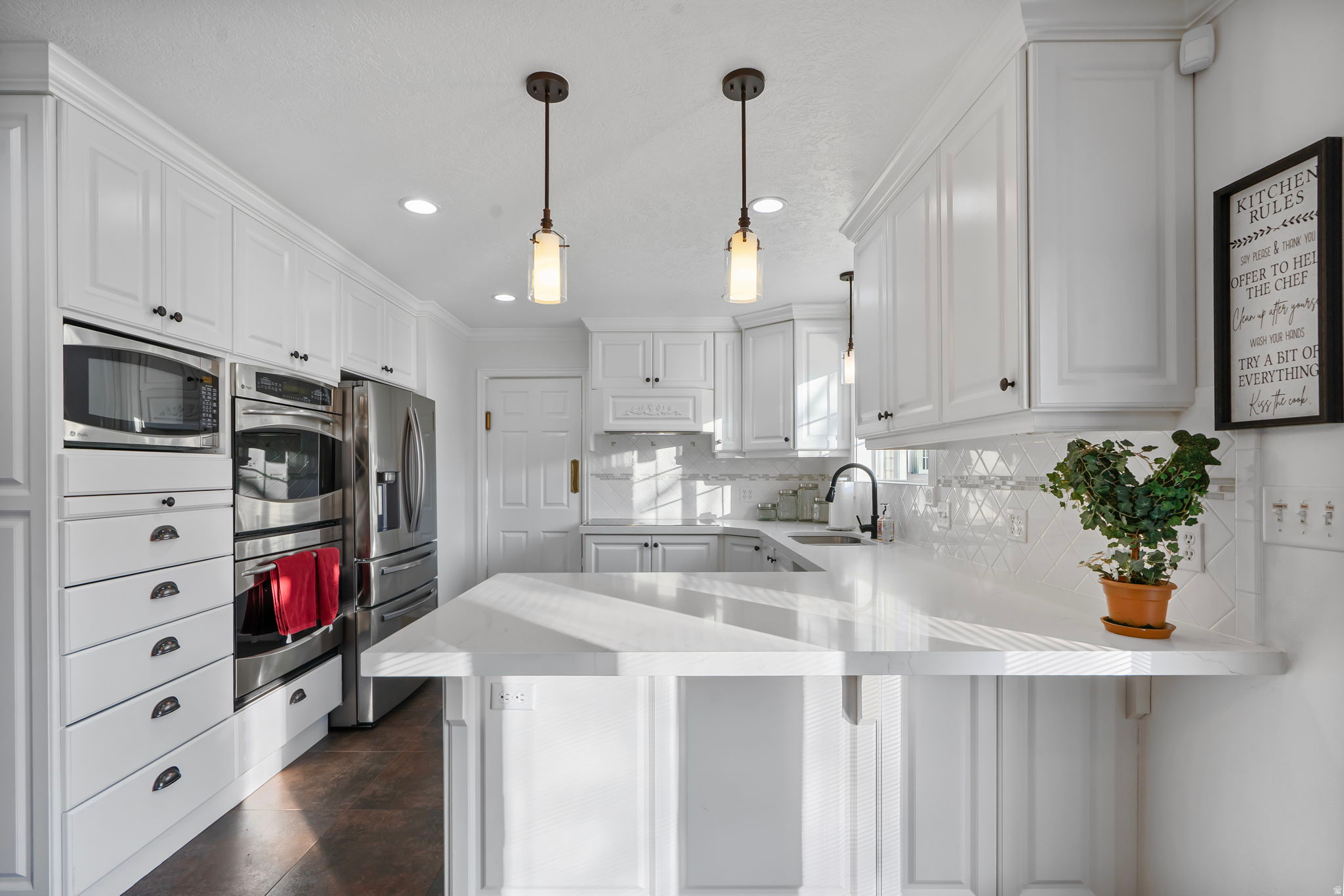 BACK on MARKET due to buyer's cold feet.  Don't miss the chance to own this hidden jewel in southeast Orem! Location is perfect, close to every type of shopping, eating or education you'd need. So many extras including a remodeled white kitchen with double ovens and new quartz counter tops. Large main floor laundry/mud room with custom cabinets. Main floor office and family room with wood burning fireplace. Nice formal entry, formal living and dining room. Owners suite has a huge walk-in closet, spacious bedroom and deluxe bathroom with jetted tub. This classic two story is timeless in design with all the upgrades you'll not find in a new home. Water softener, dual furnaces, dual AC, plantation shutters. Basement has two family rooms, new bathroom with second laundry room and a yummy cedar closet. Large 4 car garage with attic storage will hold all your toys and tools. The yard is simply Eden with it's glorious shaded patio and many varieties of Hosta plants. Two sheds, including the perfect She Shed, for retreats and storing yard furniture. The award winning yard is all perennial plantings that rotate blooms each month. Thousands have been spent in peonies, roses, iris and others- this is the best soil to be found, rich and fertile. Perennial gardening is so much easier than you think! Owner/agent for 30 years. Square Footage taken from purchase appraisal as county never got it correct. Buyer to verify all info.