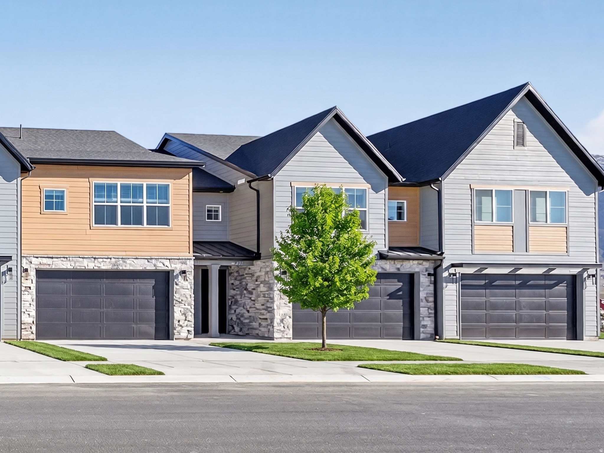 Weber County's newest and most sophisticated townhomes! Packed with high-end style, unmatched storage, expansive windows, and premium space, no other townhome on the market checks every box quite like this. Nestled in the highly desirable JDC Ranch master-planned community, with beautiful parks in every direction including right outside your back patio, this property offers a lifestyle you won't find anywhere else. Come experience the modern architecture, oversized garage, class-leading storage solutions, large bedrooms, and an incredible primary suite today! Square footage figures are provided as a courtesy estimate only and were obtained from building plans. Buyer is advised to obtain an independent measurement.