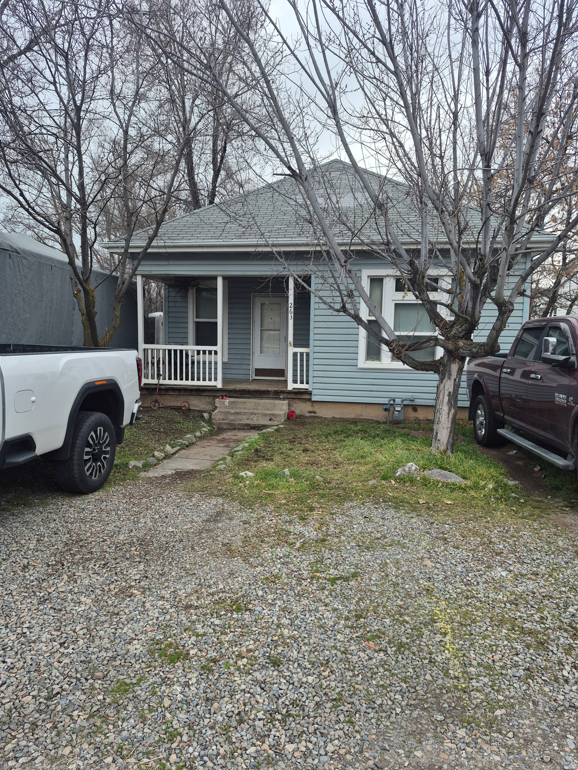 This property offers a rare opportunity with three contiguous parcels totaling approximately 2.53 acres, zoned for duplexes or single-family homes-ideal for investors, developers, or those looking to expand. The primary homesite sits on .51 acres, providing plenty of space for your toys, garden, or future plans. Inside, you'll find wood floors, vinyl windows, central air, and a tankless water heater for comfort and efficiency. Priced for immediate sale, don't miss out! Call today to schedule your showing.