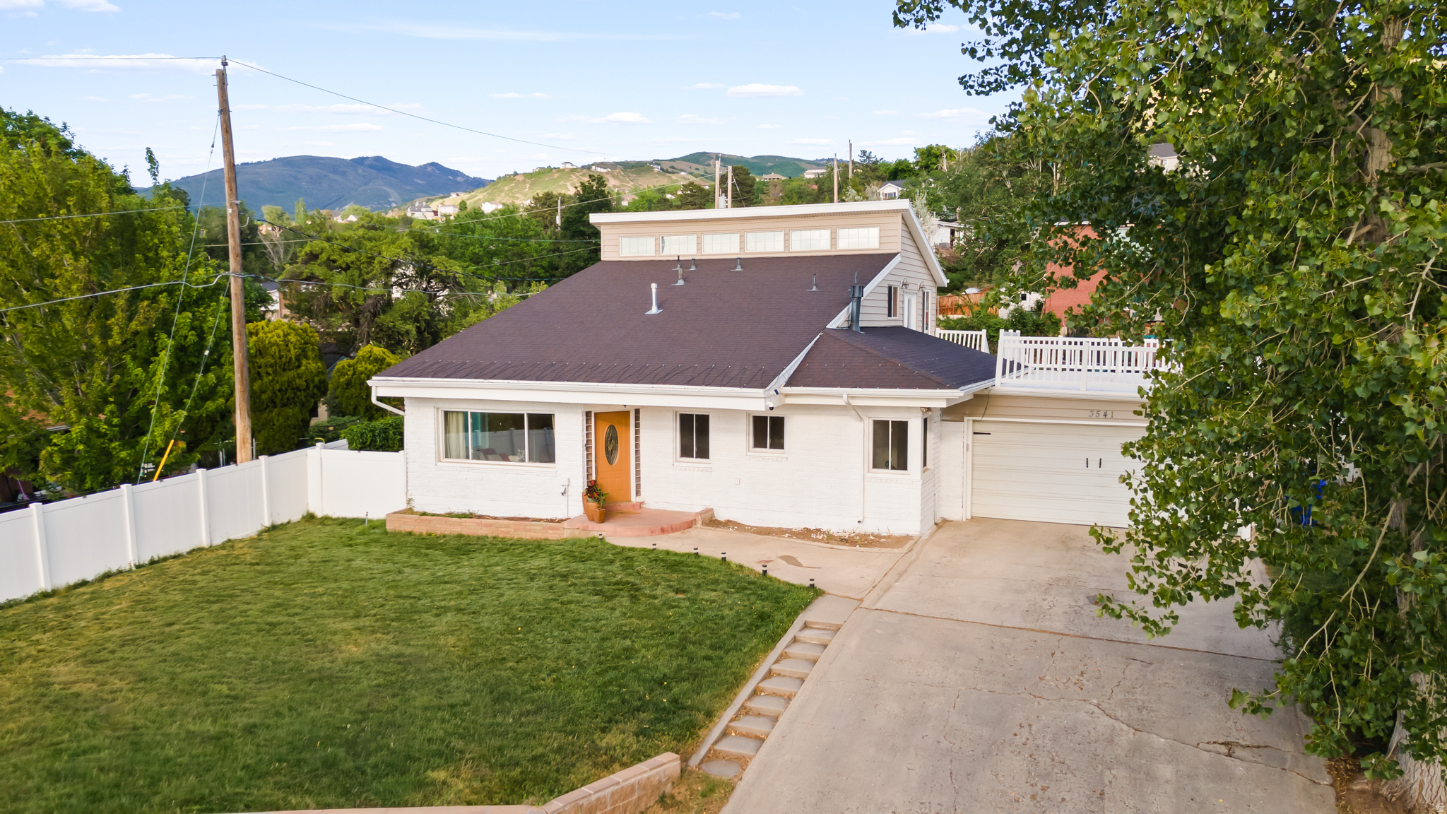 BACK ON THE MARKET! Buyer failed to perform. If you have been on the market for a while, you will be amazed to find how clean and well cared for this Bountiful home is! Tucked into a quiet neighborhood with stunning views, this spacious two-story home offers an inviting floor plan with updated finishes and excellent indoor-outdoor flow. This home features a custom kitchen and a newly added refreshments bar. This home also provides multiple living areas, including a large family room and an upper loft that leads to a rooftop deck. The outdoor spaces are a standout feature, complete with a newly finished patio and natural gas fire pit, and a private enclosed hot tub area as well. Other recent improvements include a new sprinkling system, newer furnace, AC, water heater, and water softener for added peace of mind. Located close to everyday amenities with a large attached two-car garage, this home offers the perfect blend of character and comfort. Ask about our preferred lender who is offering a free 1-0 interest rate buy down!