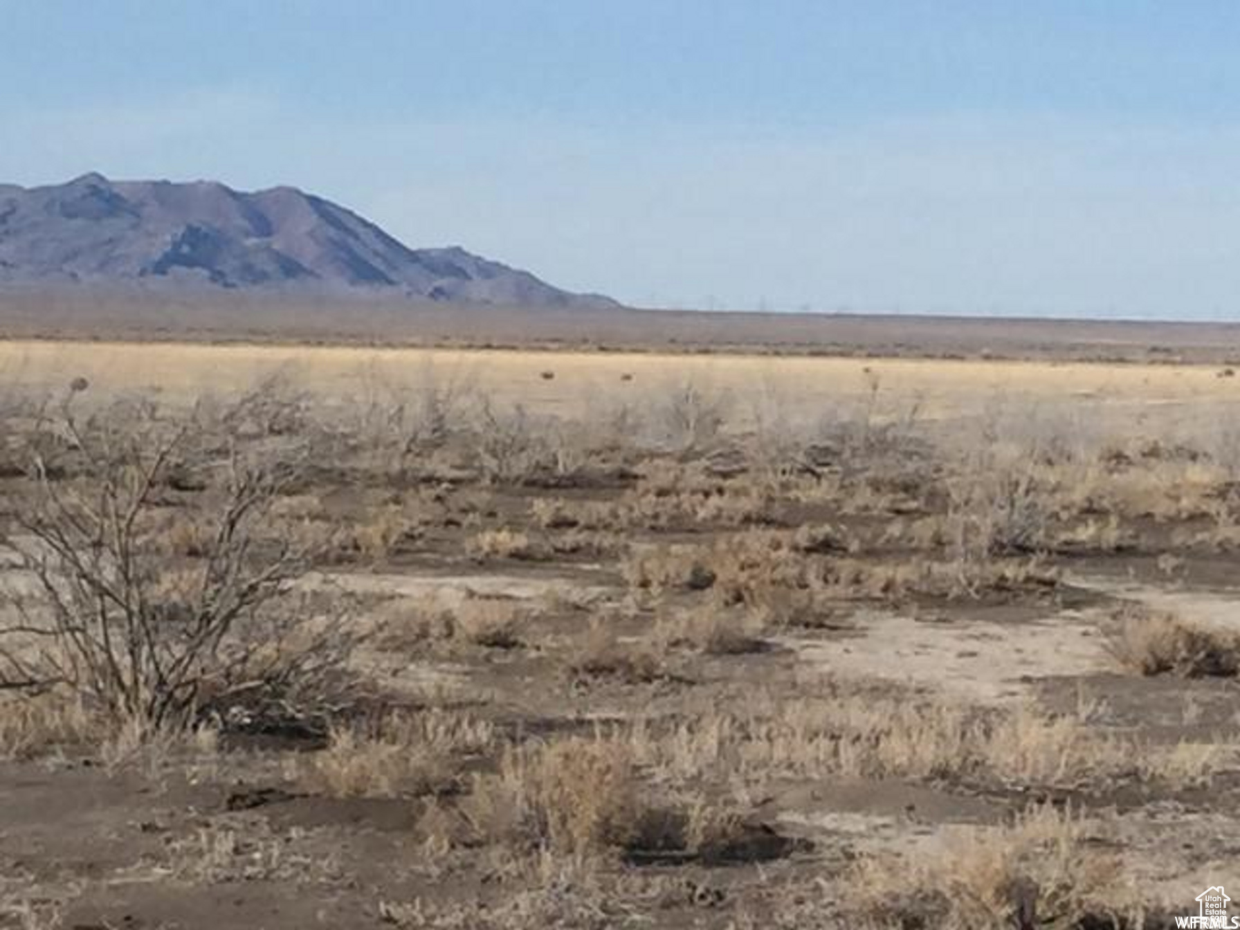 Industrial/Range land/Solar Site- so many possibilities: 520 Ac west of Delta & Hinckley, UT located 1 mile north of the Old Hwy 6 and approx 1.5 miles east of the large power line heading south. This could make a great place for a large industrial operation or solar farm! Located in Section 16-Township 17 South- Range 9 West. Millard County is a growing area for mining, farming , feeding operations and energy. Seller willing to consider financing the buyer - terms negotiable. Many upcoming expansions are coming to Millard County. Currently zoned Range & Forest, but you could apply for a zone change of your choice to fit your needs. Maps and address are approx. Buyer to verify all information. Traditionally accessed through dirt roads on private property. There are not county maintained roads to the property that the seller is aware of. -112.87740  39.33790