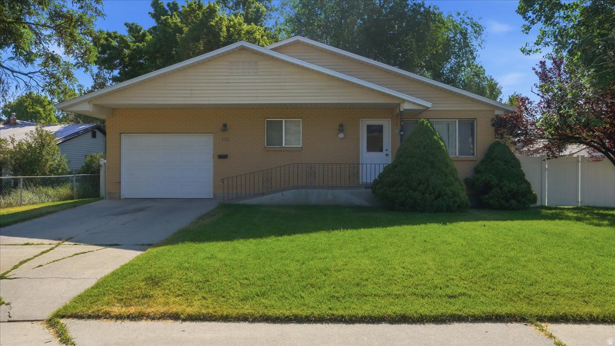 Open House: Saturday, June 27 | 10:00 AM  12:00 PM. Welcome home to the heart of downtown! This charming 4-bedroom, 2-bath gem blends city convenience with the warmth and comfort of a true home. Step inside to a beautifully updated kitchen and fresh new flooring that flow naturally through the space - clean, bright, and move-in ready from day one. The big-ticket items are already taken care of: a new HVAC system keeps things comfortable year-round, and a roof replaced just 3 years ago means total peace of mind. Outside, enjoy your own private backyard retreat - perfect for morning coffee, weekend gatherings, or simply unwinding after a busy day. A 1-car garage rounds out this incredibly well-cared-for property. Homes like this - updated, charming, and in a prime downtown location - don't last long.  Come see it for yourself! Buyer to verify all information.  Square footage figures are provided as a courtesy estimate only.  Buyer is advised to obtain an independent measurement.