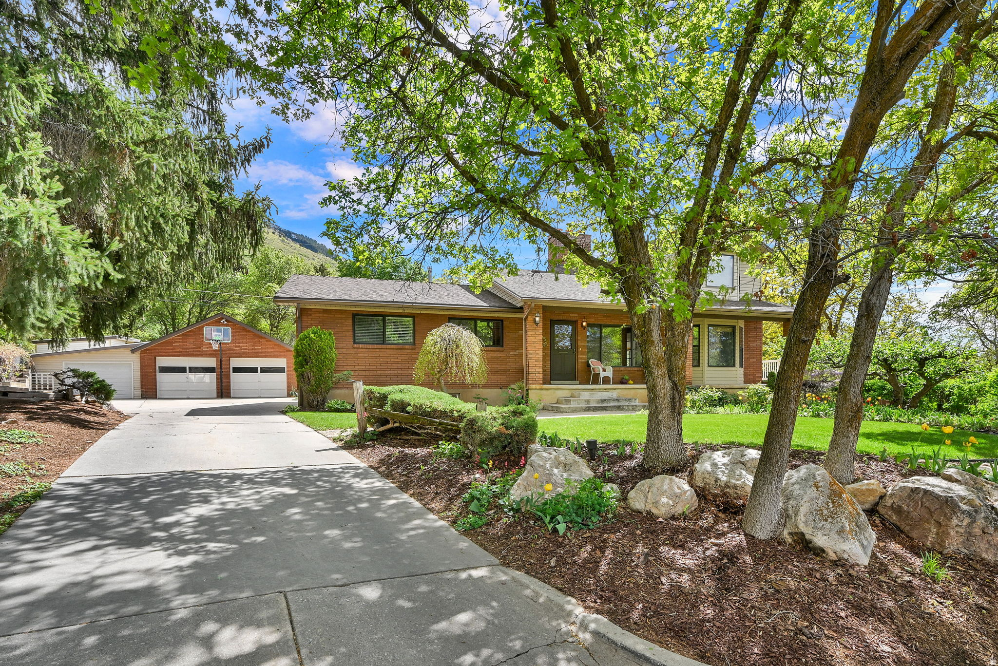 Beautiful North Ogden Home on large quiet lot.  Mega Insulated flexible design is perfect for large or multi generational households.  Grand Master suite upstairs with huge jetted tub, walk in closet fireplace and more!! Come see for yourself!