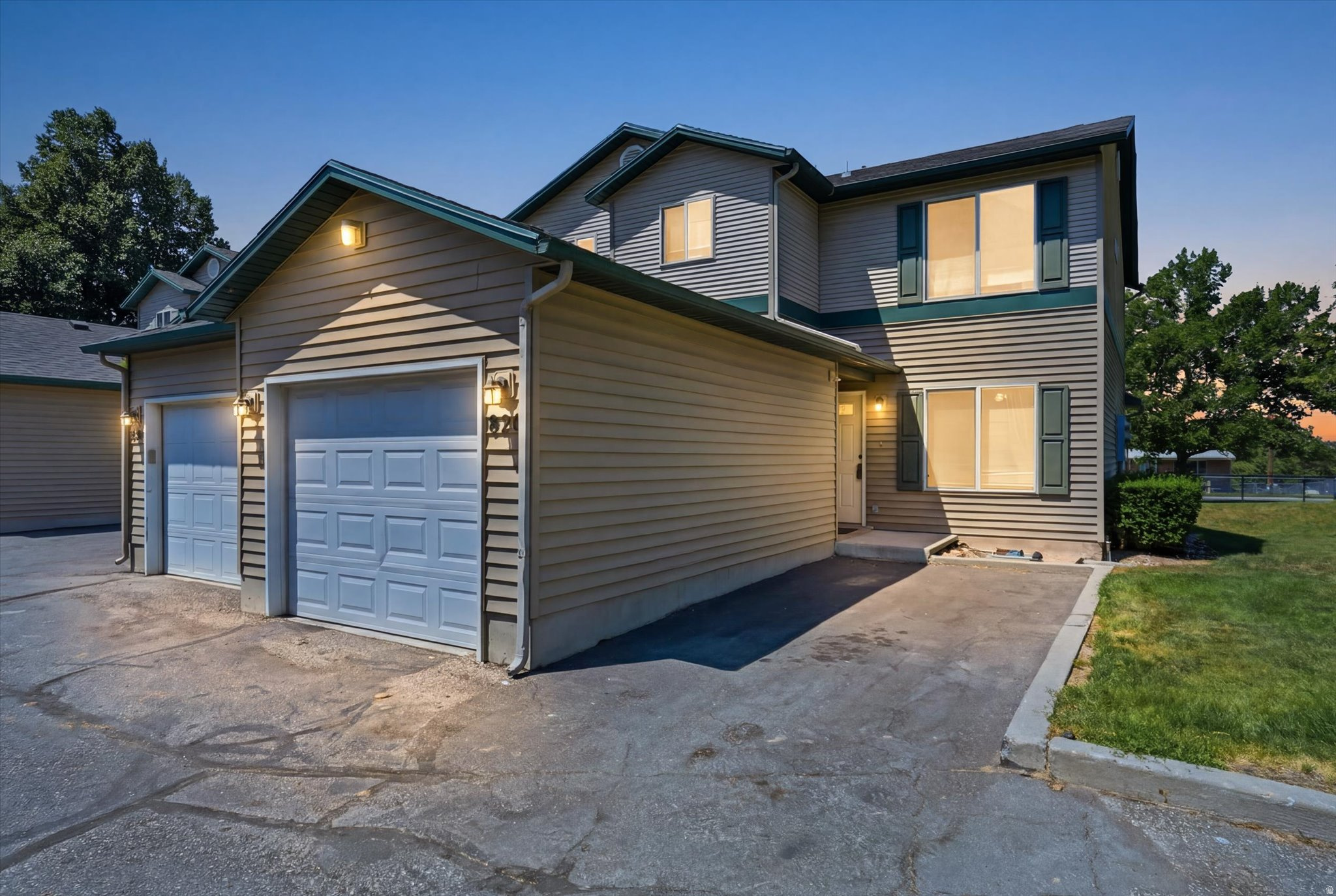 This charming townhouse offers a functional and comfortable layout designed for easy living. The main level features a welcoming living area, a bright and spacious kitchen, and the convenience of a half bath and laundry area. Upstairs, you'll find all bedrooms along with a full bathroom, providing added privacy and separation from the main living spaces. Enjoy the benefits of an attached one-car garage, offering secure parking and additional storage space. The professionally managed HOA maintains the community while keeping monthly dues affordable at just $235 per month. Clean, well-maintained, and move-in ready, this inviting home is located in a friendly, attractive community with convenient access to shopping, dining, and outdoor recreation. Don't miss the opportunity to make this wonderful townhouse your new home-schedule a showing today! Assumable Loan Option.