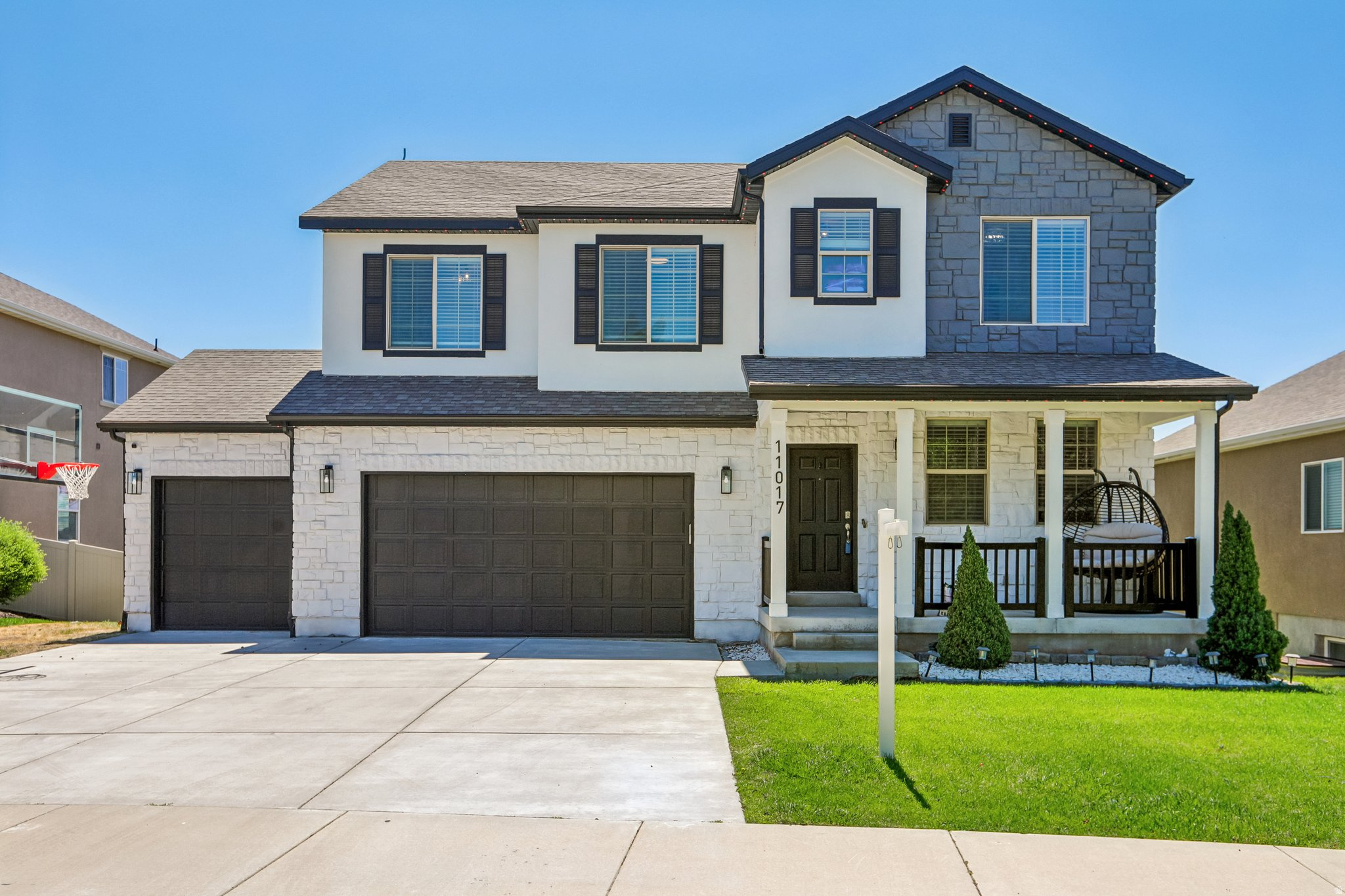 Beautifully updated home in an established neighborhood in the heart of South Jordan. Updated modern exterior colors, tastefully upgraded interior, this home has it all! Vaulted ceilings, quartz counter tops, LVP flooring, spacious layout, and plenty of natural light. Entertain without limits in the large living area, walk out deck, and large front patio. With 4 bedrooms upstairs, and 2 more down, there is plenty of separation for the early risers or late sleepers. Minutes from the District, you'll find plenty to do around your new home.