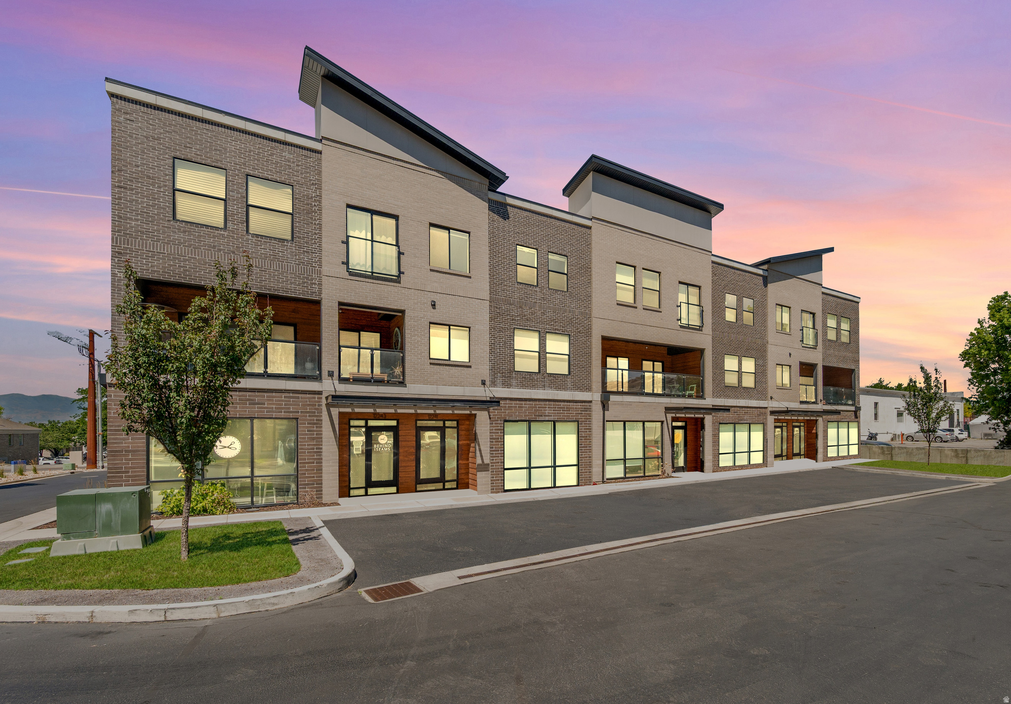Work downstairs. Live upstairs. Build the life you actually want. One of only 15 in an exclusive, live/work development, this stunning Draper townhome is a rare find. The fully commercial-grade ground floor (approx. 600 sq ft) features an ADA-compliant bathroom, glass store-front windows, customer parking, and a private lockout entry ideal for a boutique office, studio, salon, therapy practice, or any client-facing business. Above the commercial suite, the residence delivers the lifestyle to match. High ceilings and premium finishes set the tone throughout, while custom built-ins, designer lighting, and motorized window shades on every window speak to a level of craftsmanship rarely found at this price point. The kitchen opens to a covered patio, perfect for morning coffee or an evening wind-down, and the 2-car attached garage adds everyday convenience. With 3 spacious bedrooms and thoughtful details at every turn, including a tankless water heater for on-demand efficiency, this home is as functional as it is beautiful.